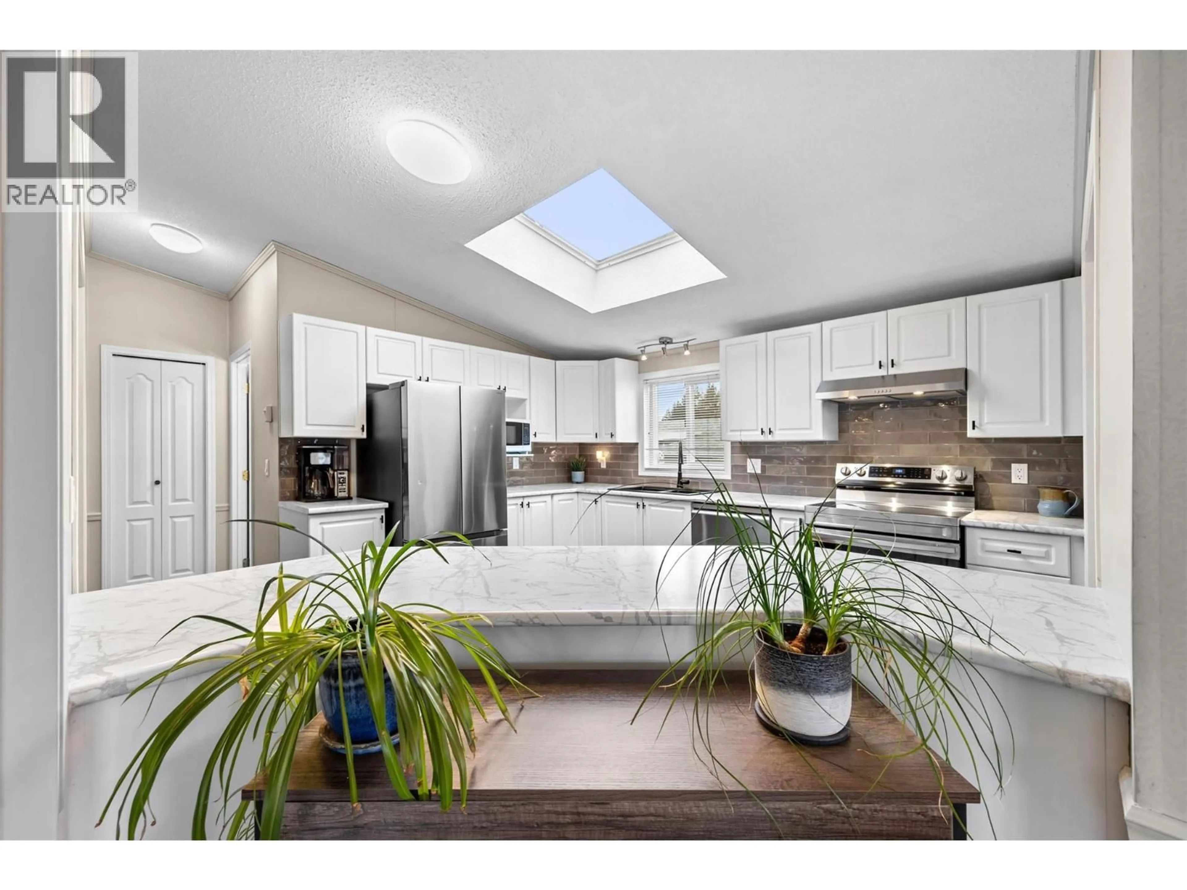 Open concept kitchen, ceramic/tile floor for 93 - 1850 SHANNON LAKE ROAD, West Kelowna British Columbia V4T1L6