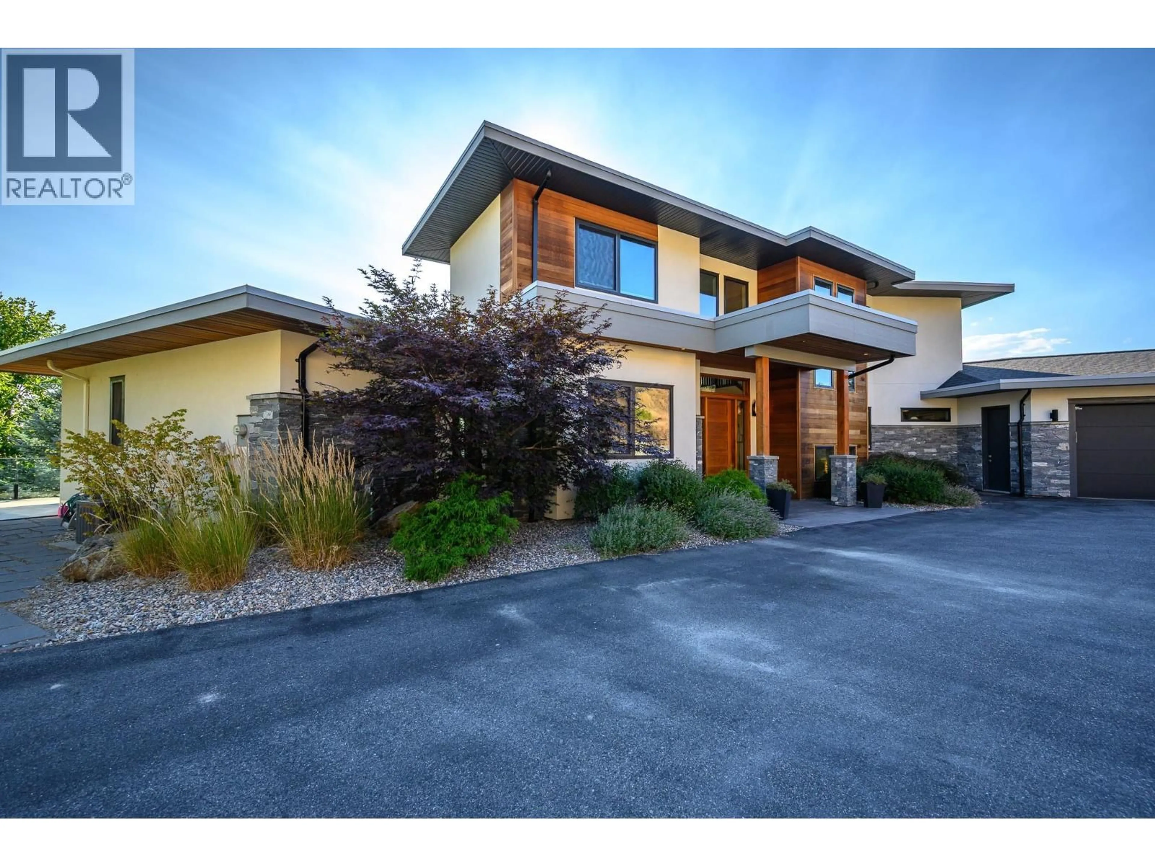 Home with brick exterior material, street for 195 RAVINE DRIVE, Coldstream British Columbia V1B4C9