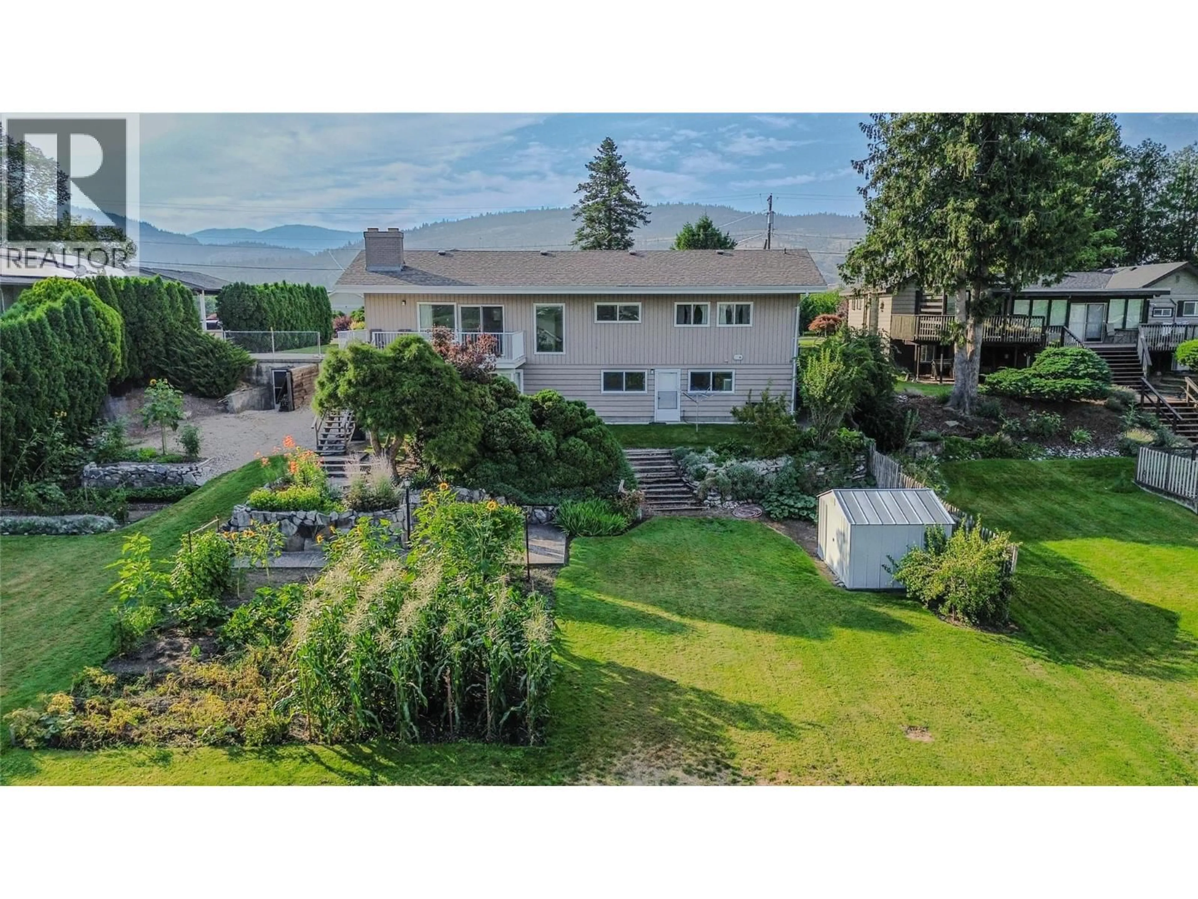 A pic from outside/outdoor area/front of a property/back of a property/a pic from drone, unknown for 5608 YARROW STREET, Oliver British Columbia V0H1T9