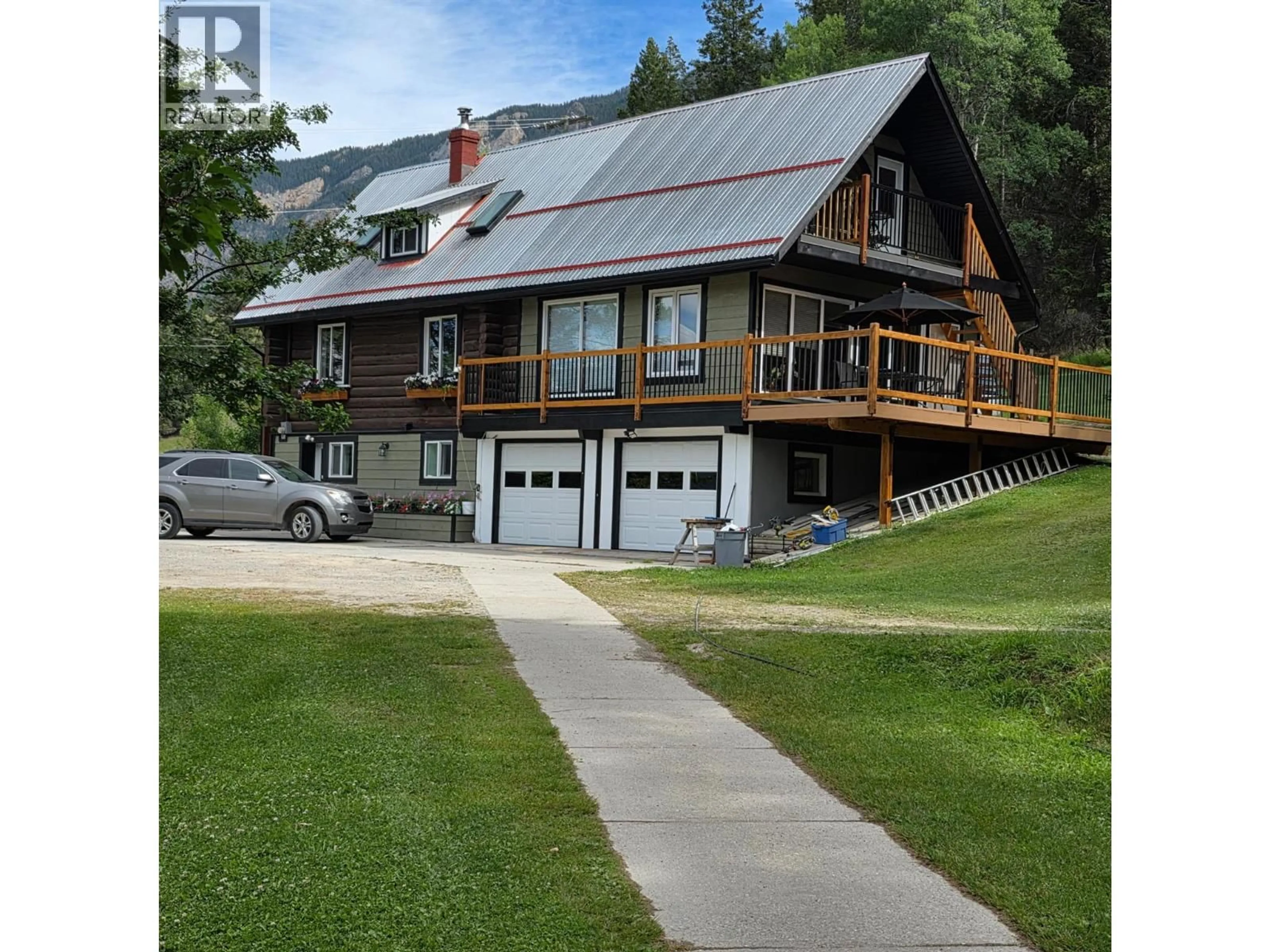 A pic from outside/outdoor area/front of a property/back of a property/a pic from drone, unknown for 5564/5574 HIGHWAY 95 HIGHWAY, Edgewater British Columbia V0A1E0
