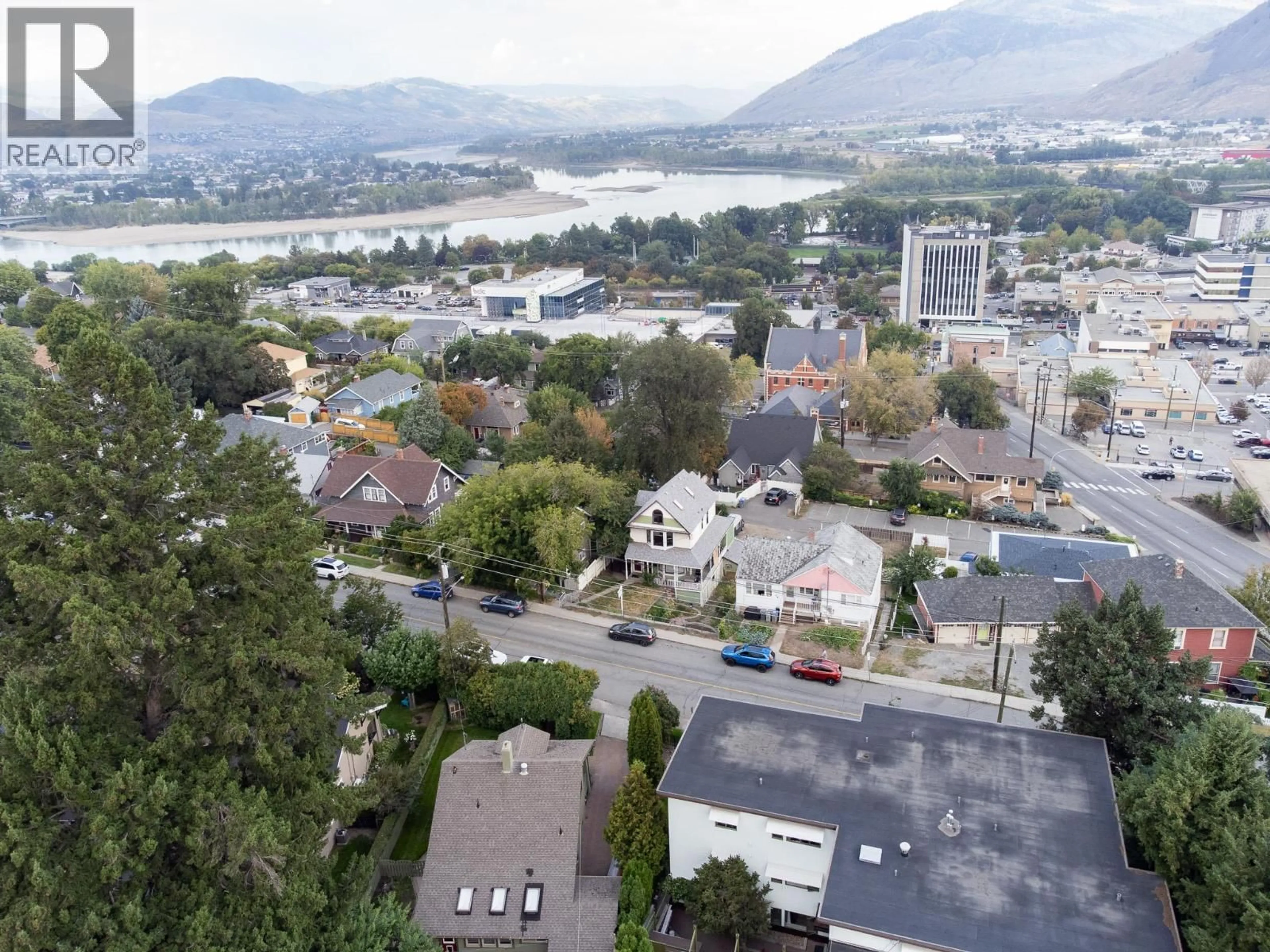 A pic from outside/outdoor area/front of a property/back of a property/a pic from drone, mountain view for 32 BATTLE STREET WEST, Kamloops British Columbia V2C1G6