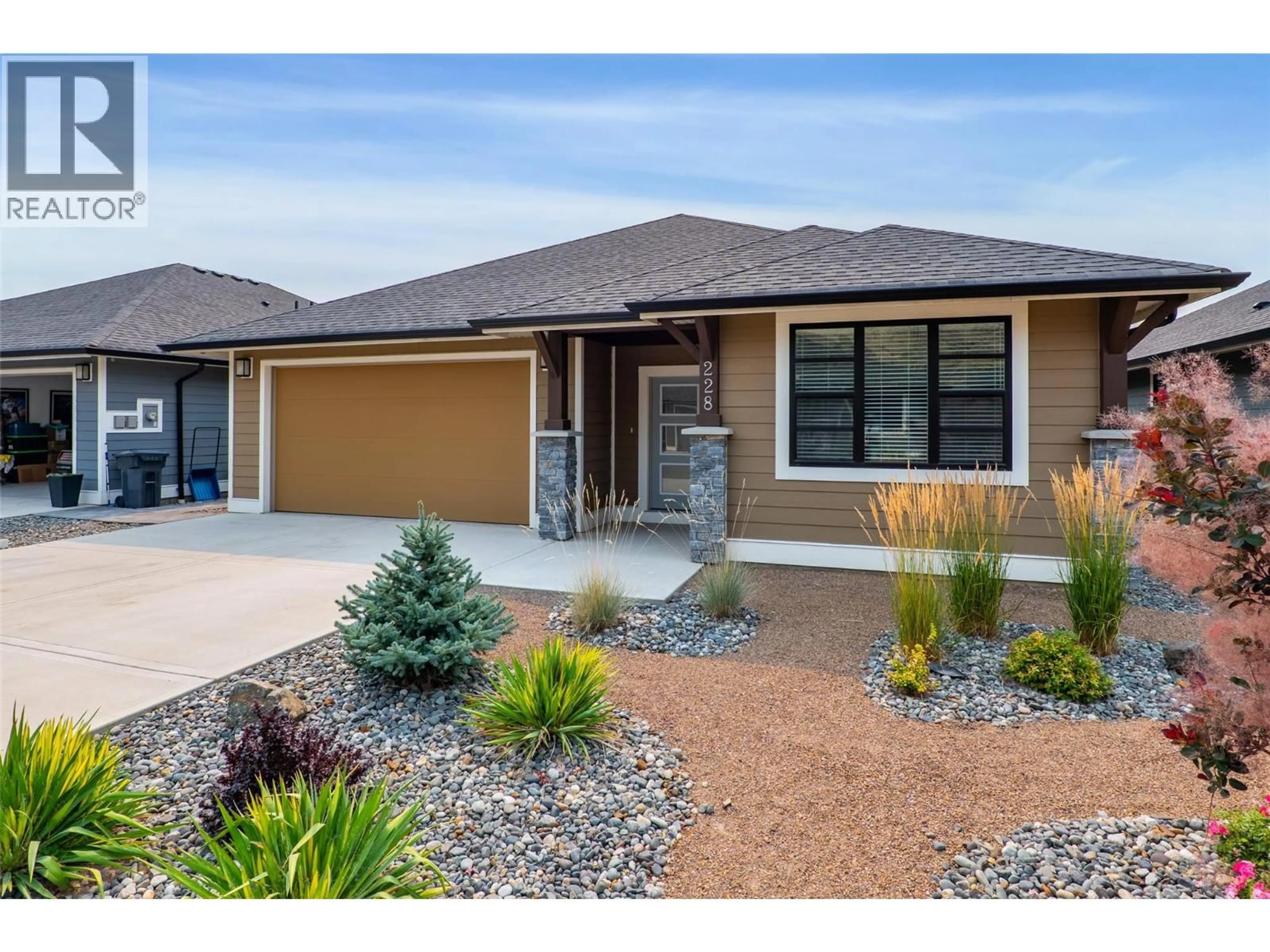 Home with brick exterior material, street for 228 - 641 SHUSWAP ROAD EAST, Kamloops British Columbia V2H0E2