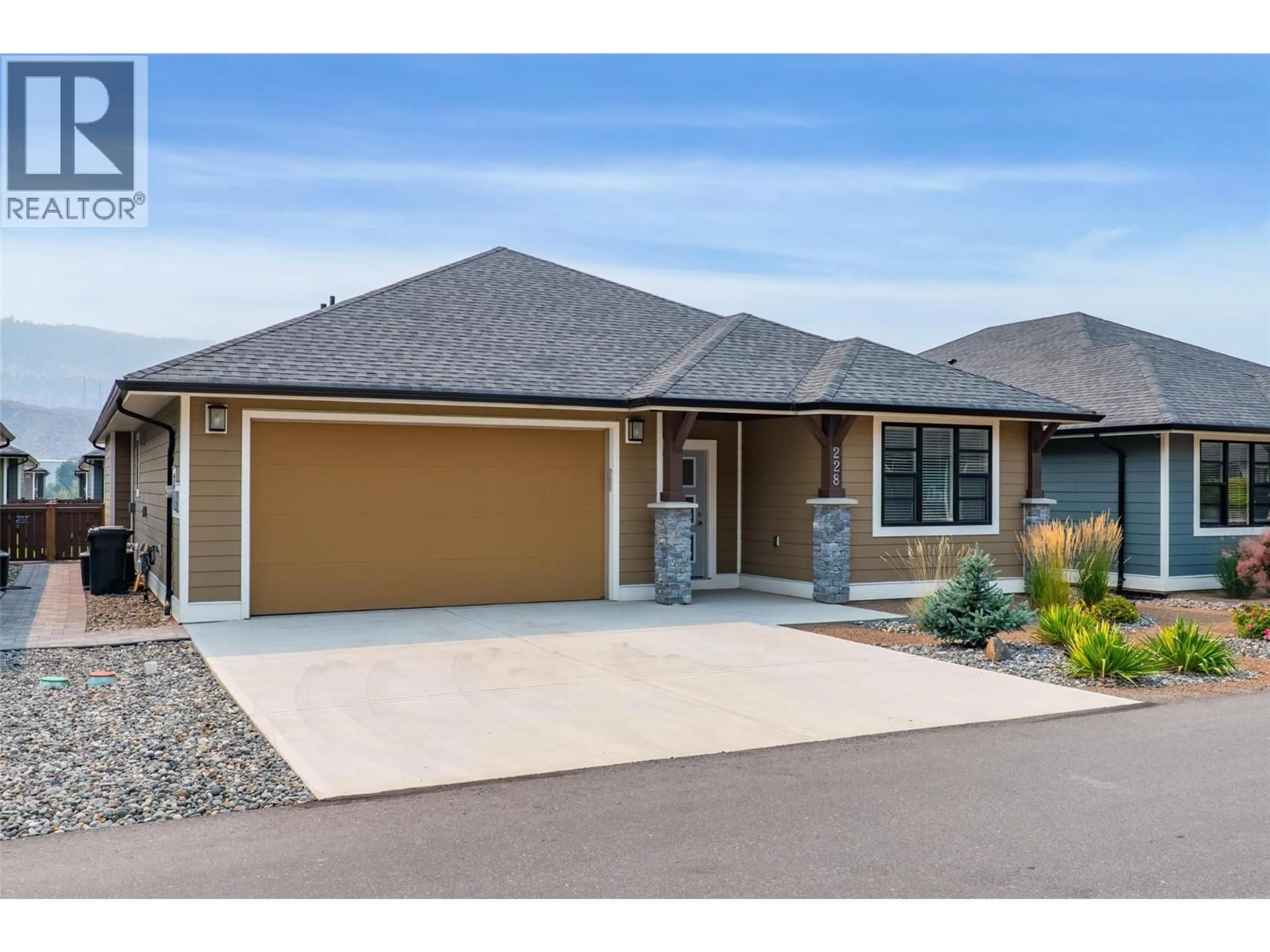 Home with vinyl exterior material, street for 228 - 641 SHUSWAP ROAD EAST, Kamloops British Columbia V2H0E2