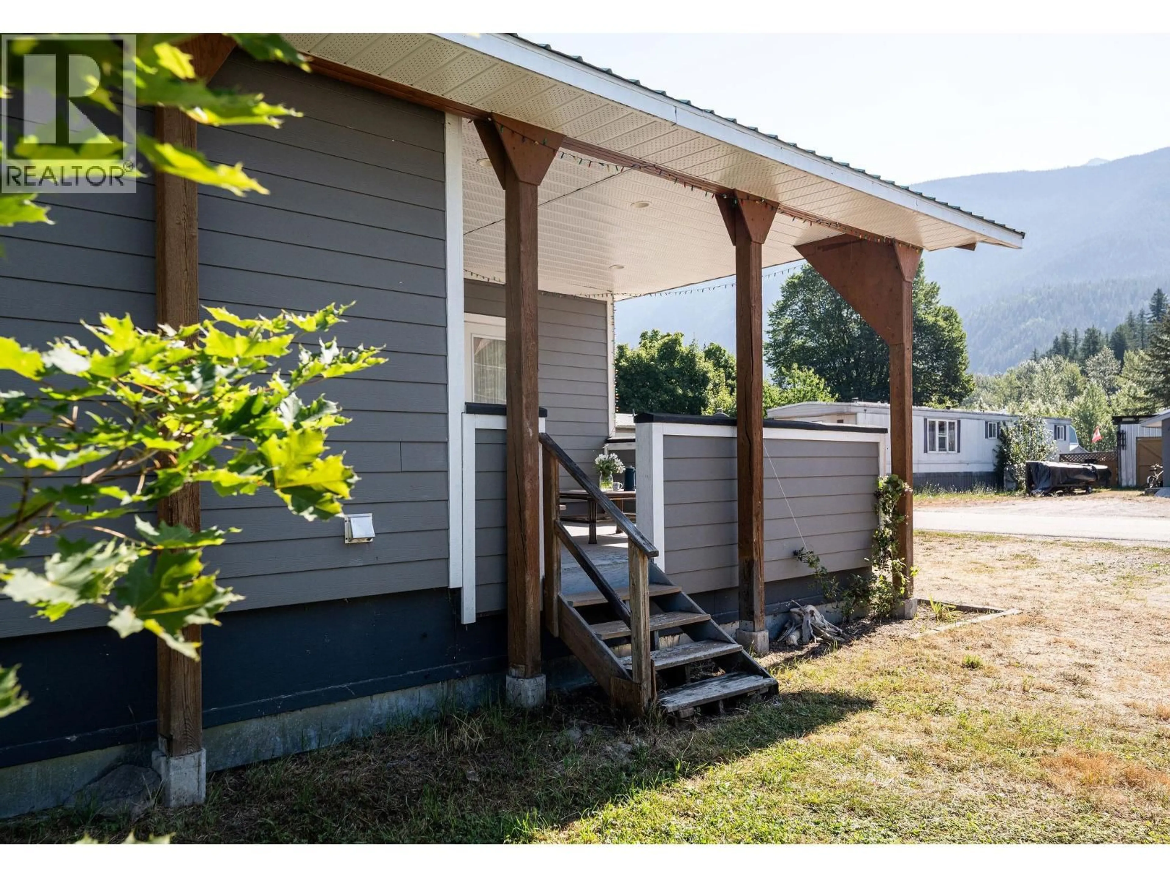 Home with vinyl exterior material, street for 2 - 1204 MAPLEWOOD STREET, Revelstoke British Columbia V0E2S0
