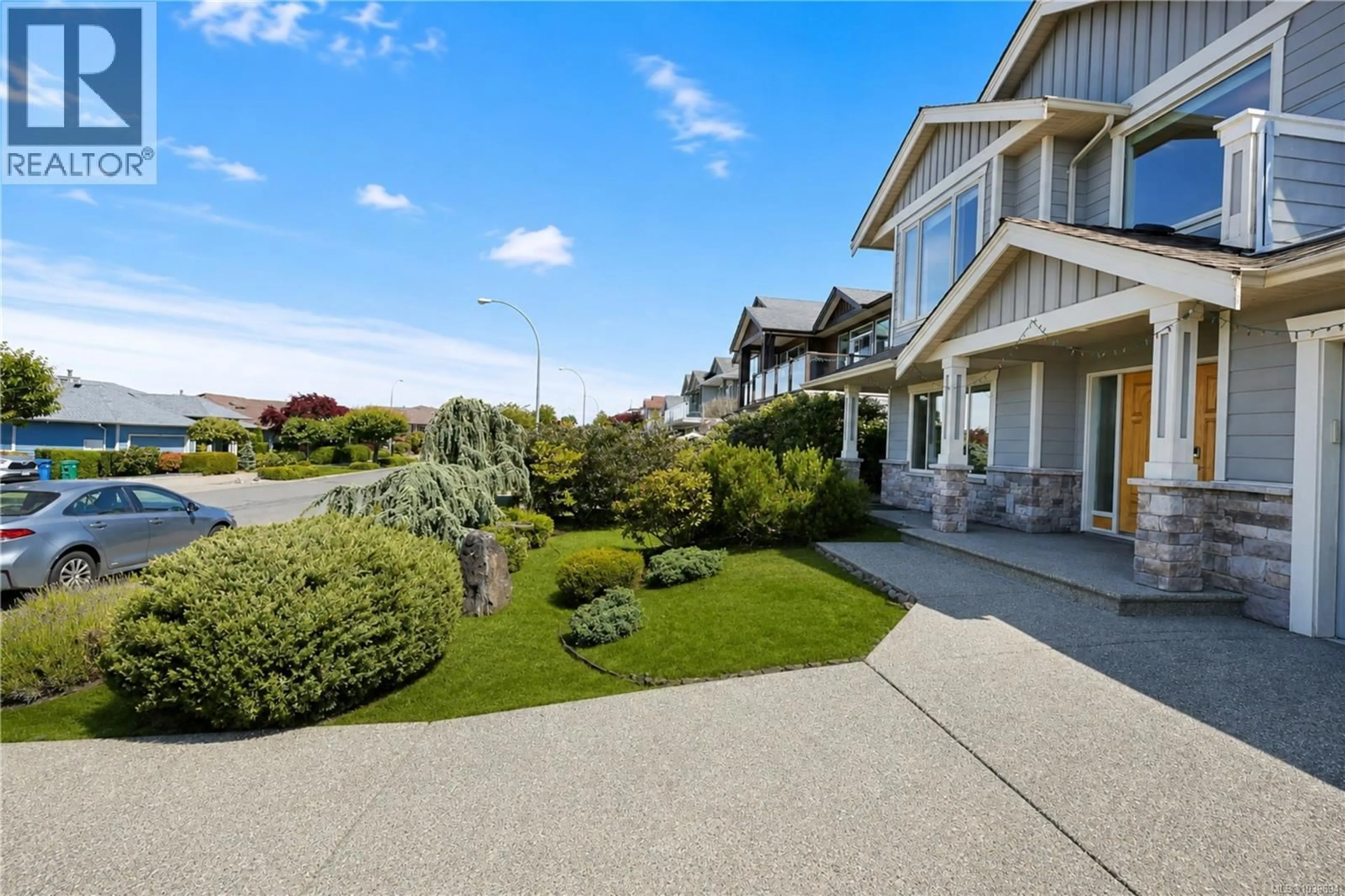 A pic from outside/outdoor area/front of a property/back of a property/a pic from drone, street for 6485 GROVELAND DRIVE, Nanaimo British Columbia V9V1V4