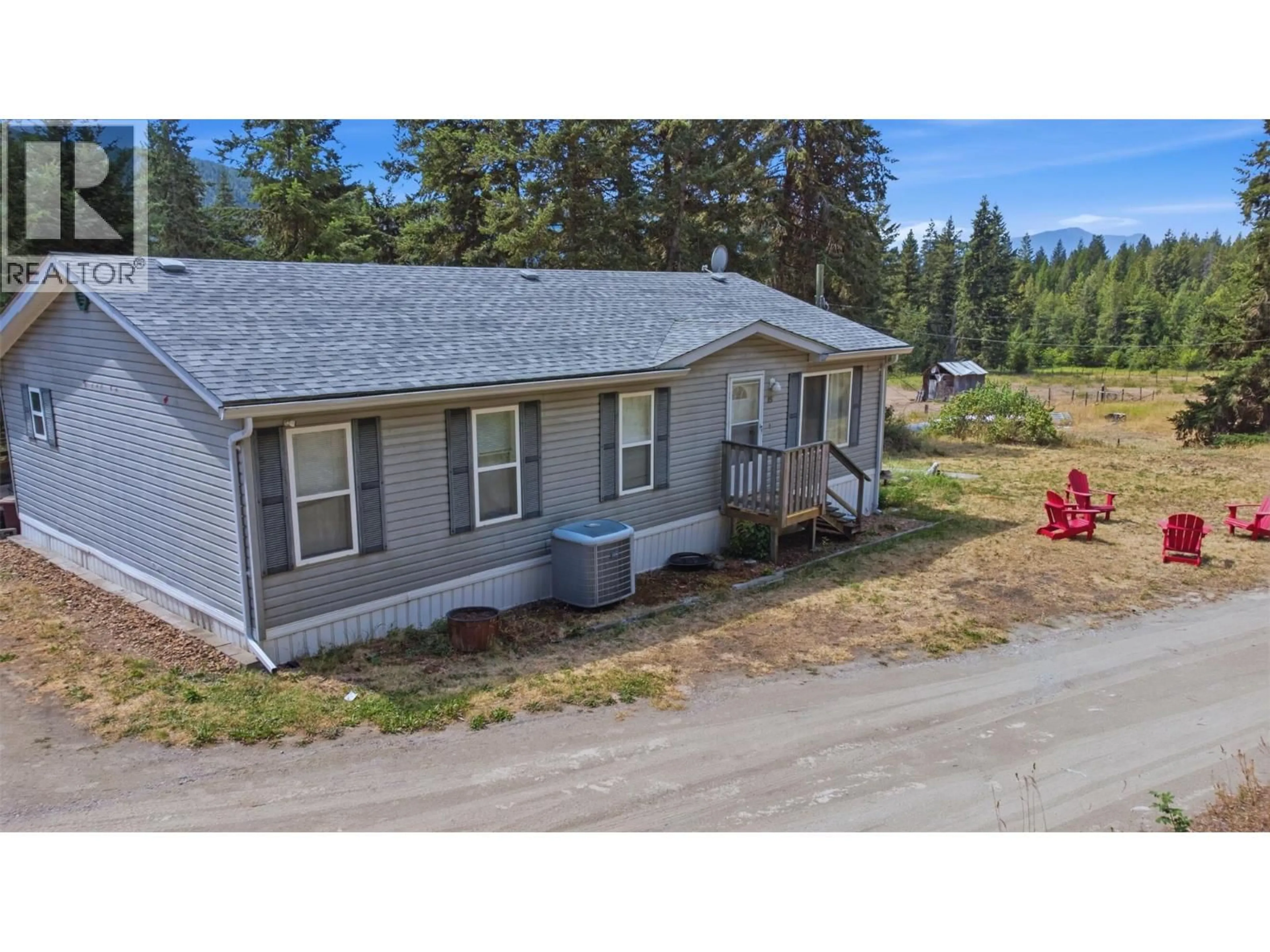 A pic from outside/outdoor area/front of a property/back of a property/a pic from drone, unknown for 85 CANDIDE DRIVE, Lumby British Columbia V0E2G1