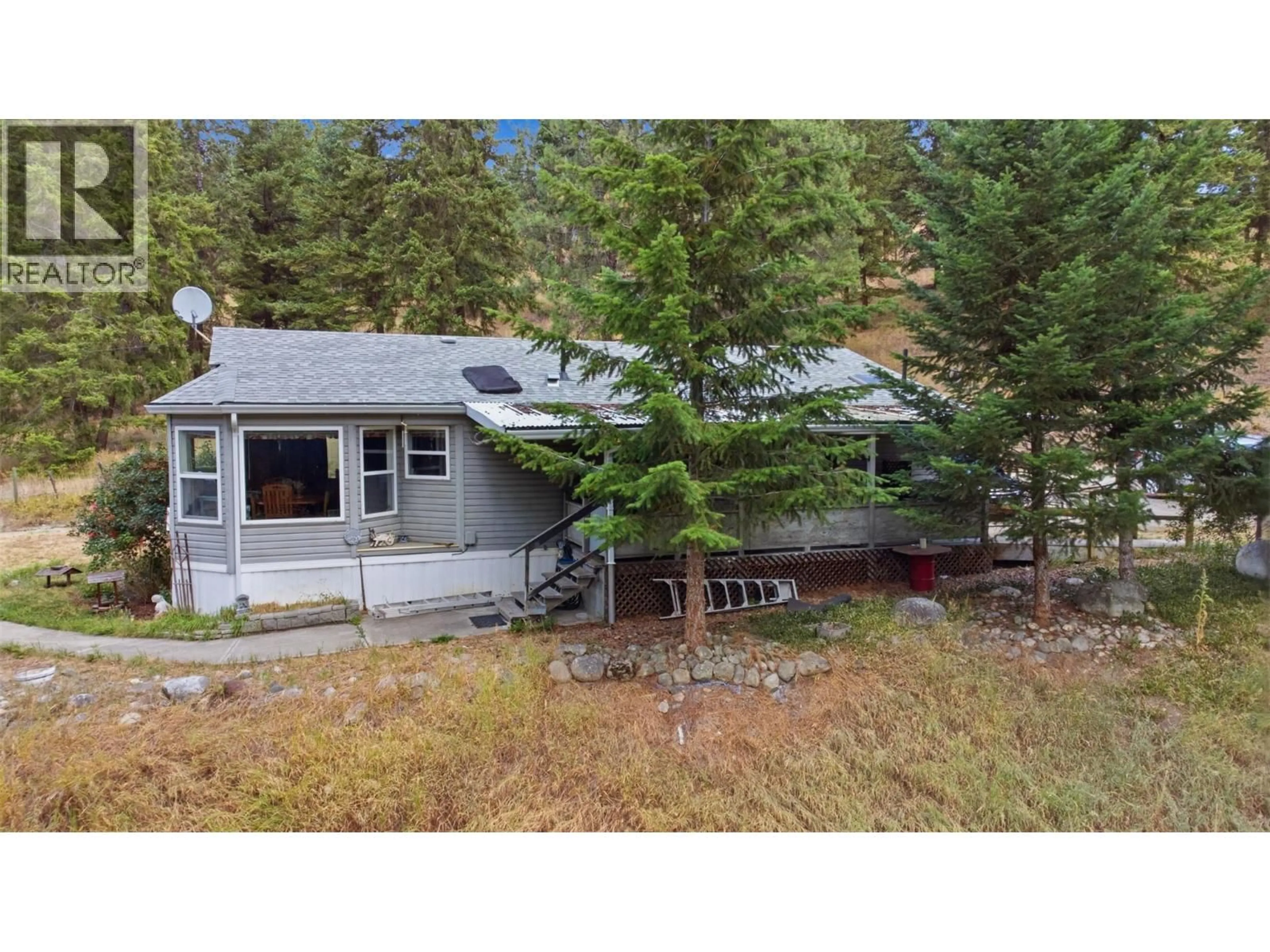 A pic from outside/outdoor area/front of a property/back of a property/a pic from drone, unknown for 85 CANDIDE DRIVE, Lumby British Columbia V0E2G1