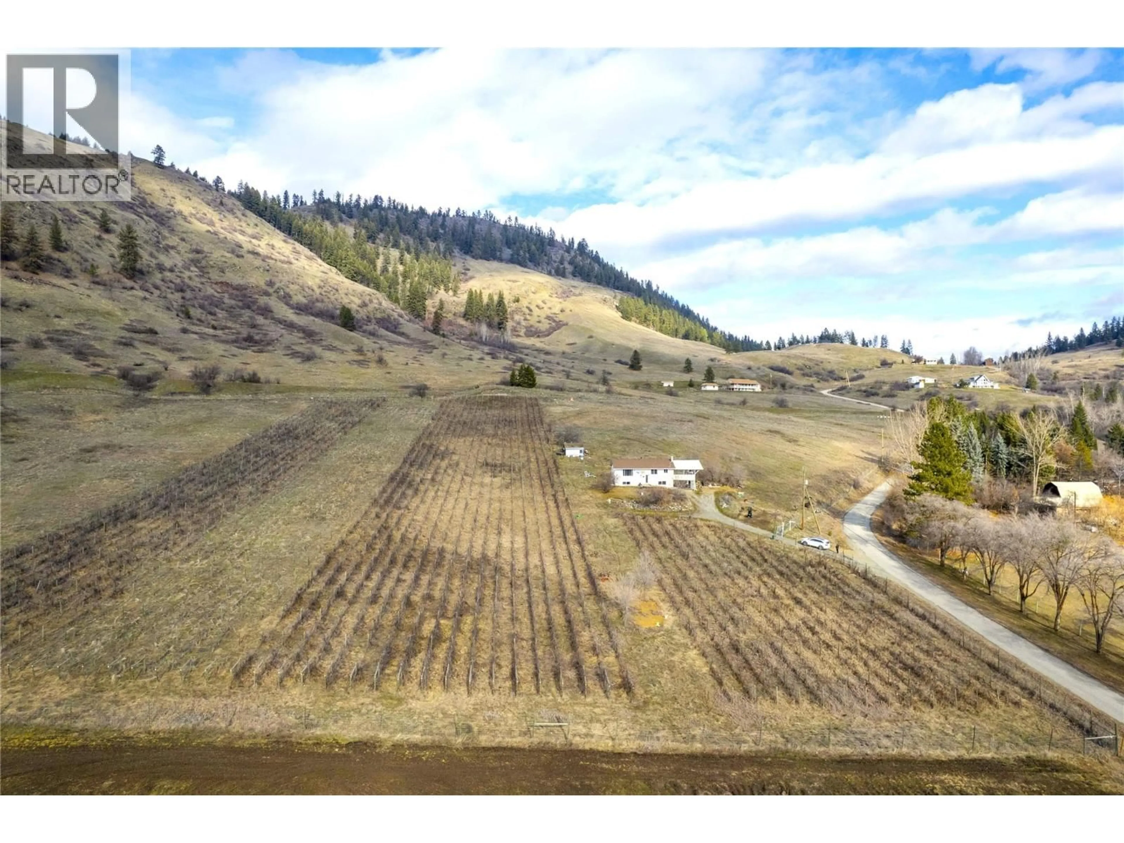 A pic from outside/outdoor area/front of a property/back of a property/a pic from drone, mountain view for 6805 RESERVOIR ROAD, Grand Forks British Columbia V0H1H5