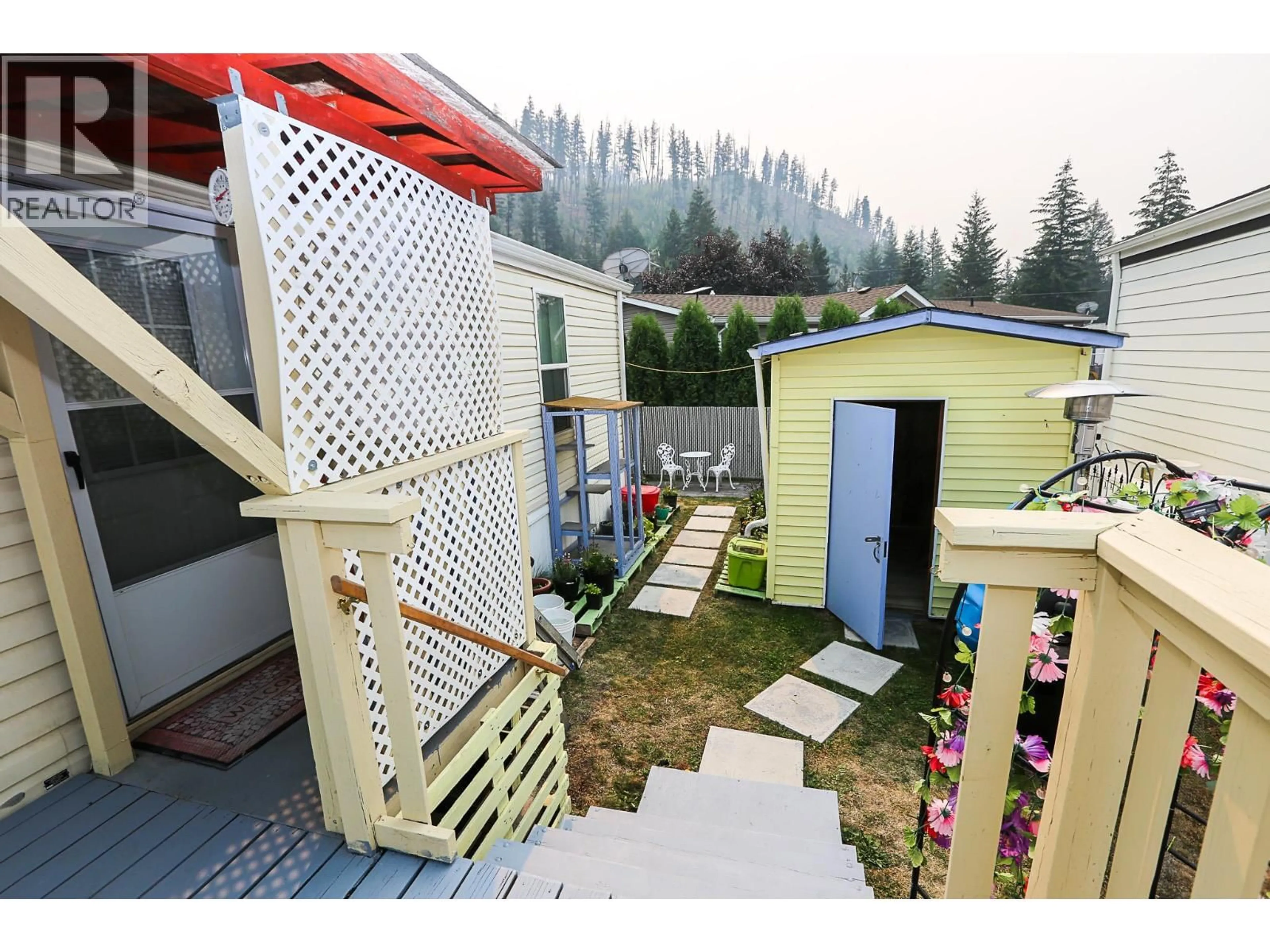 A pic from outside/outdoor area/front of a property/back of a property/a pic from drone, mountain view for 35 - 4510 POWER ROAD, Barriere British Columbia V0E1E0