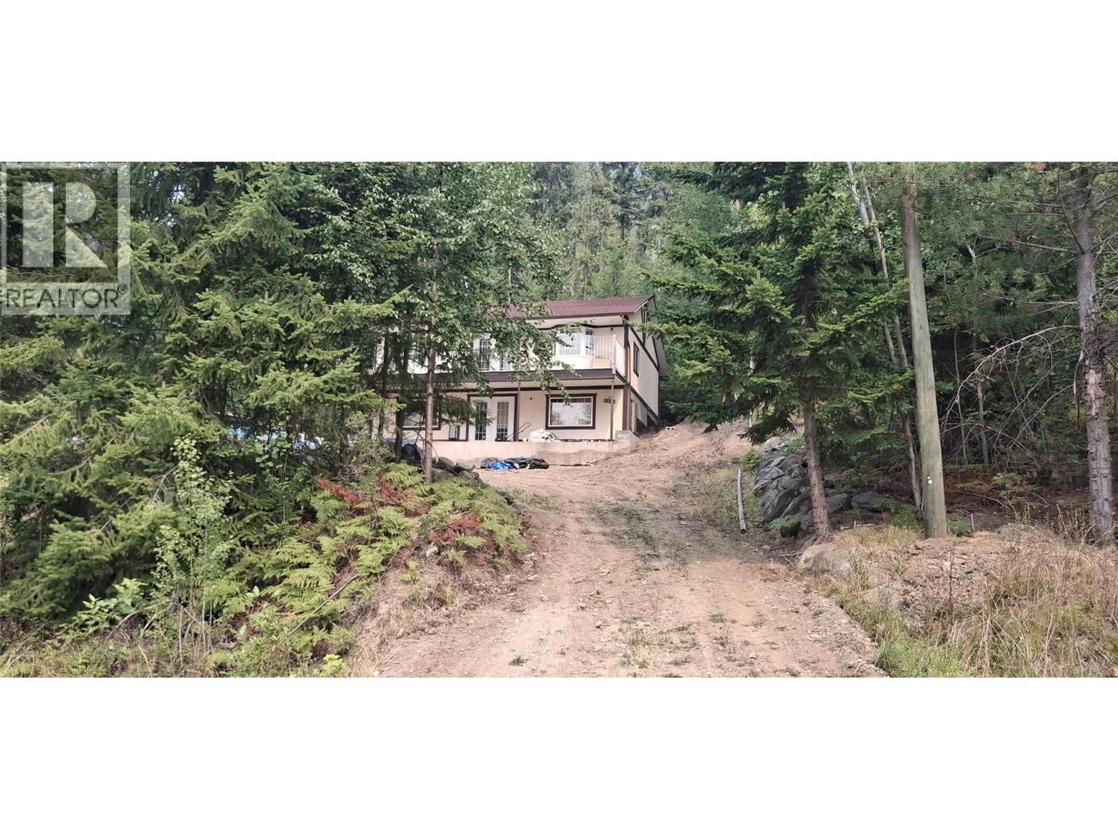 A pic from outside/outdoor area/front of a property/back of a property/a pic from drone, forest/trees view for 7475 ANGLEMONT WAY, Anglemont British Columbia V0E1M8