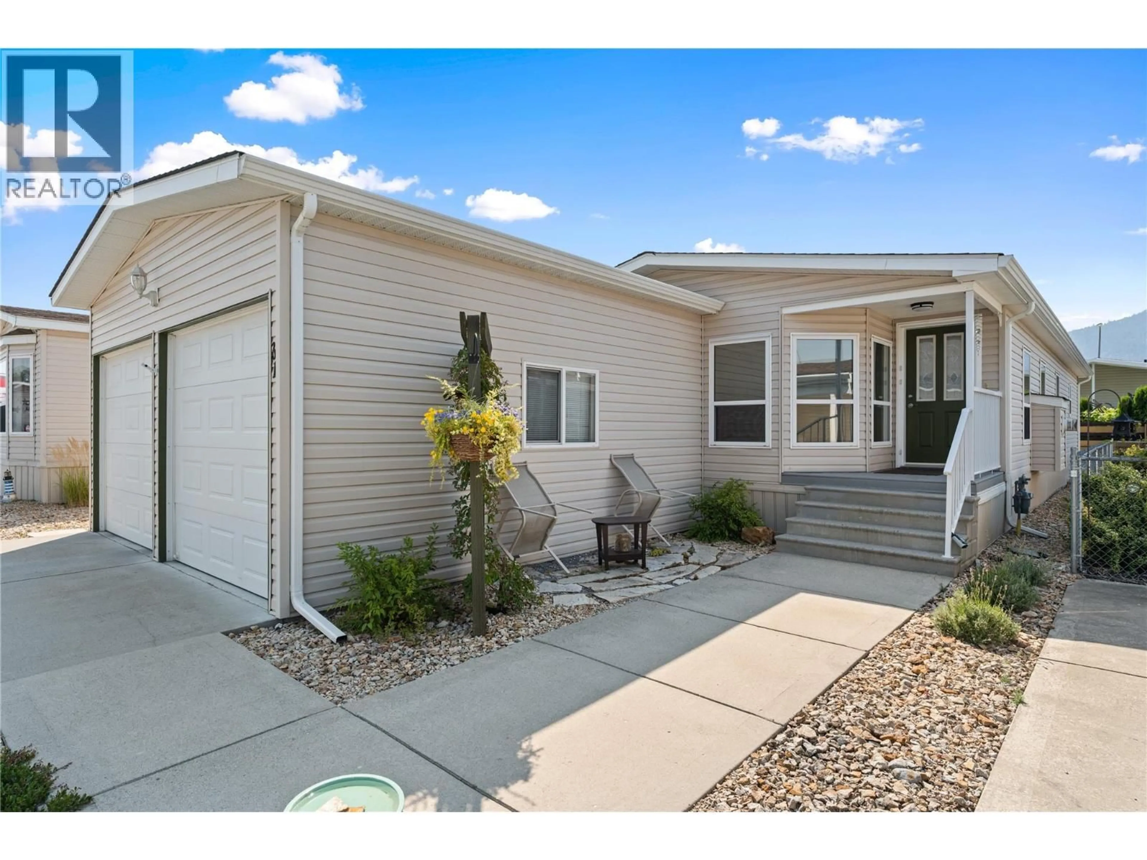 Home with vinyl exterior material, street for 31 - 6688 TRONSON ROAD, Vernon British Columbia V1H1R9