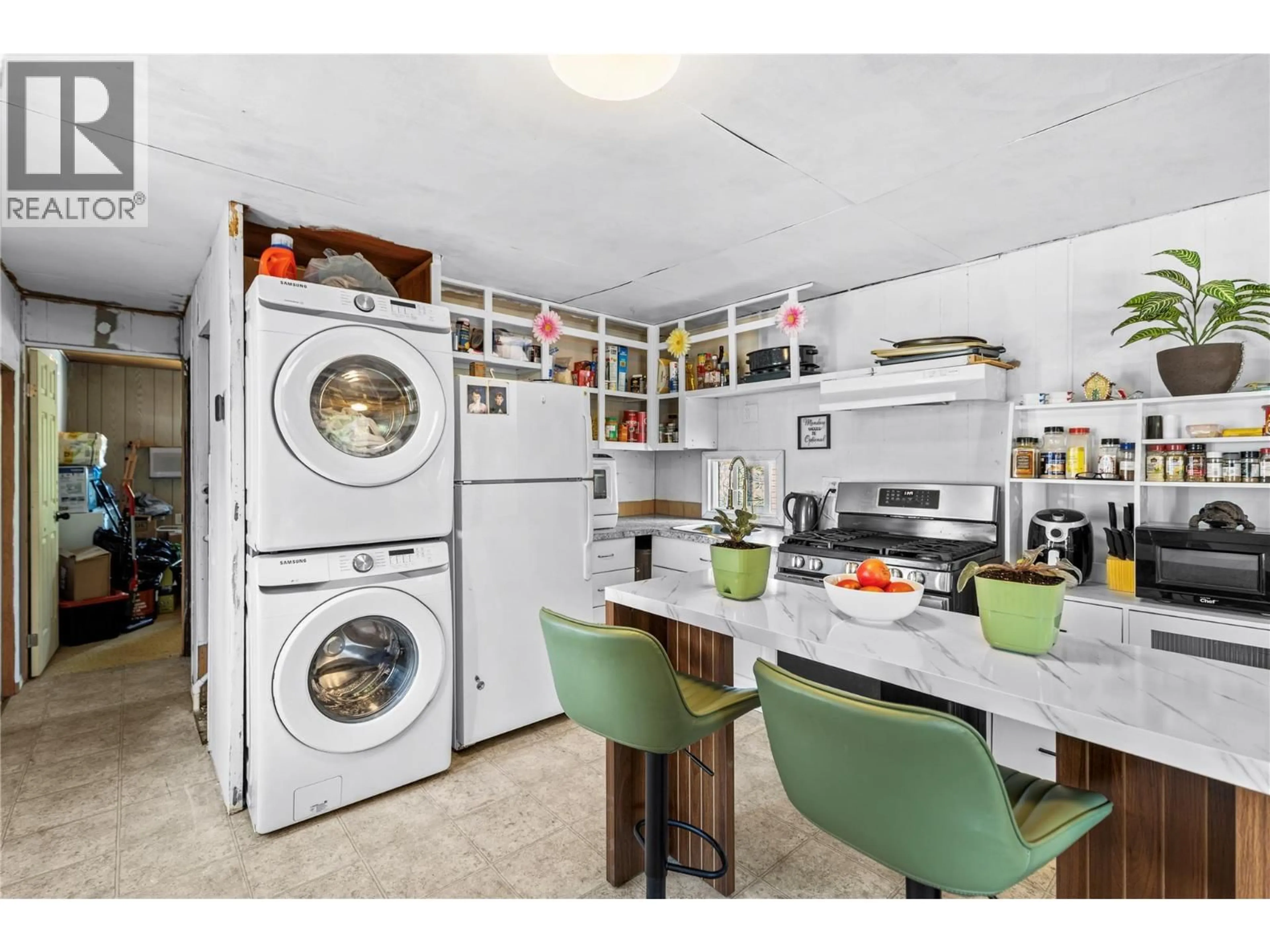 Kitchen with laundary machines, unknown for 102 - 1175 ROSE HILL ROAD, Kamloops British Columbia V2E1G9