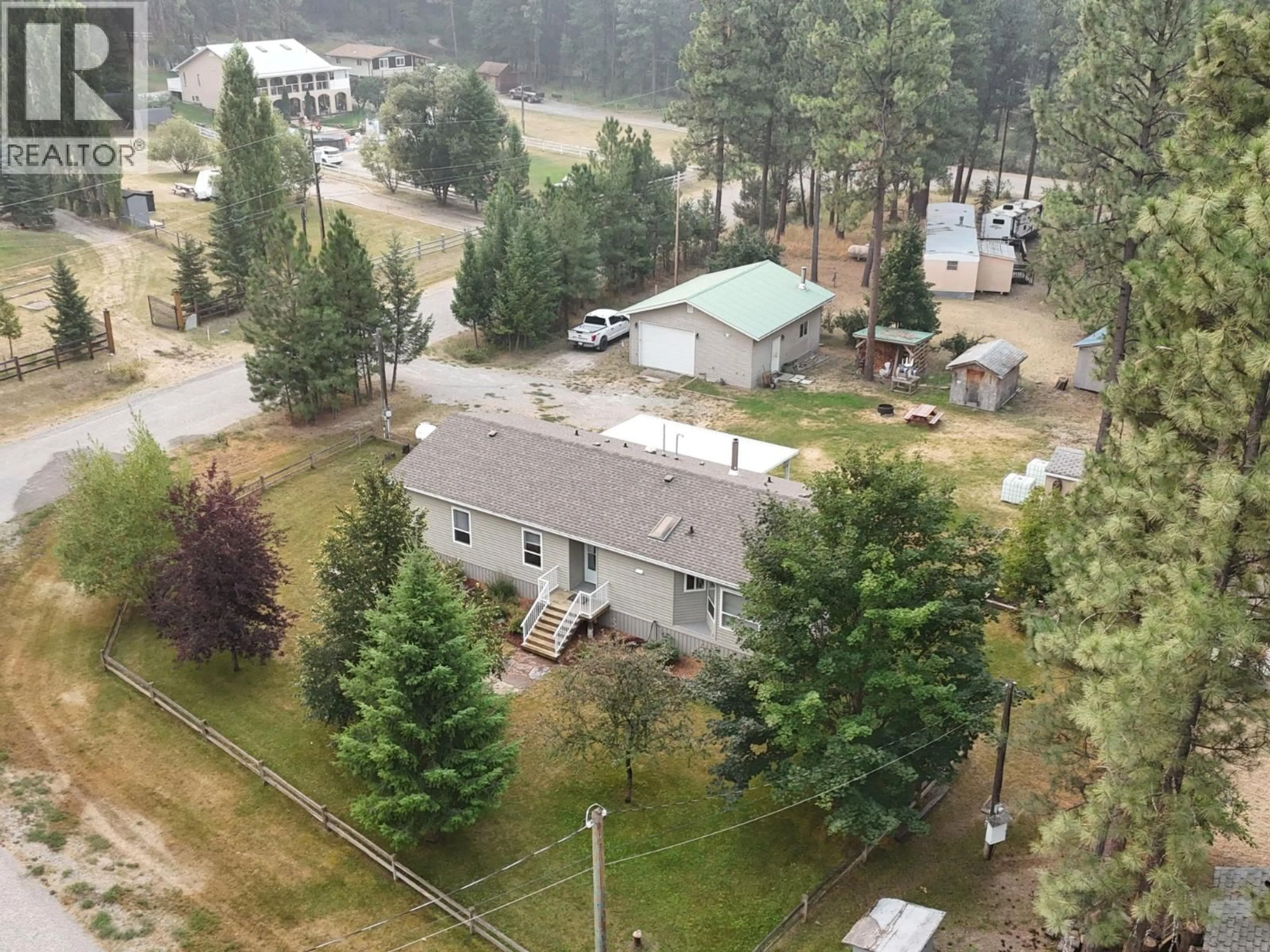 A pic from outside/outdoor area/front of a property/back of a property/a pic from drone, mountain view for 6311 ASH ROAD, Wasa British Columbia V0B2K0