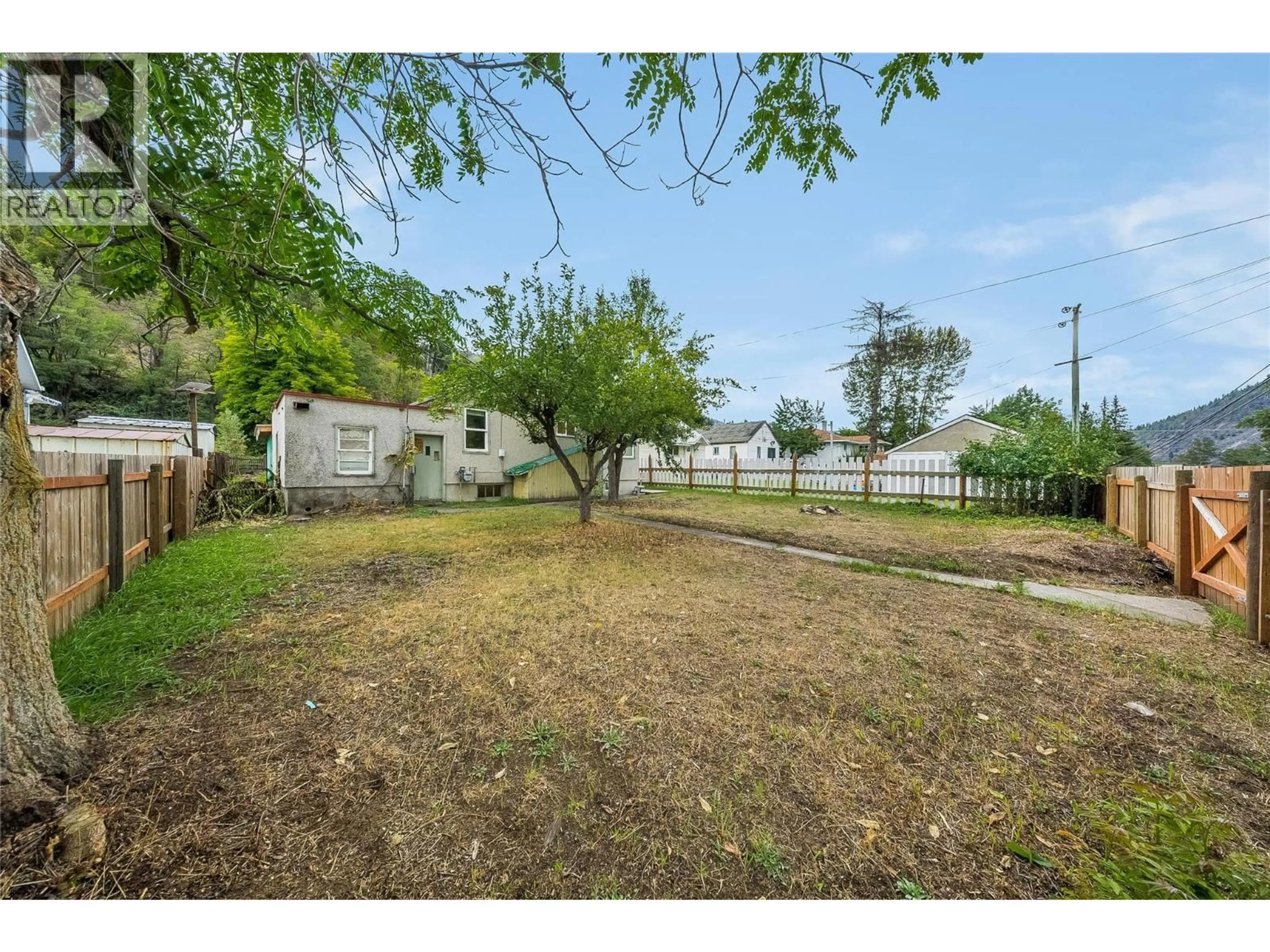 A pic from outside/outdoor area/front of a property/back of a property/a pic from drone, street for 2258 EIGHTH AVENUE, Trail British Columbia V1R3E3