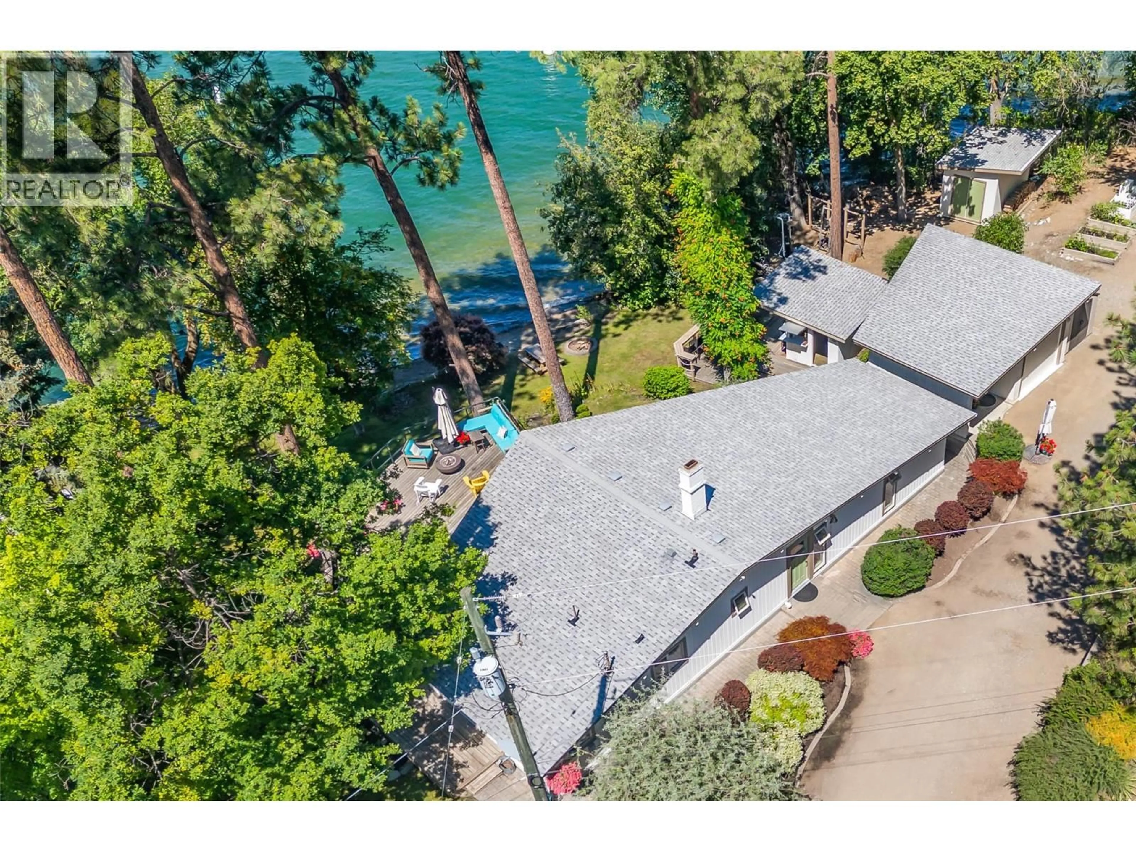 A pic from outside/outdoor area/front of a property/back of a property/a pic from drone, water/lake/river/ocean view for 12110 TREWHITT ROAD WEST, Lake Country British Columbia V4V2A6