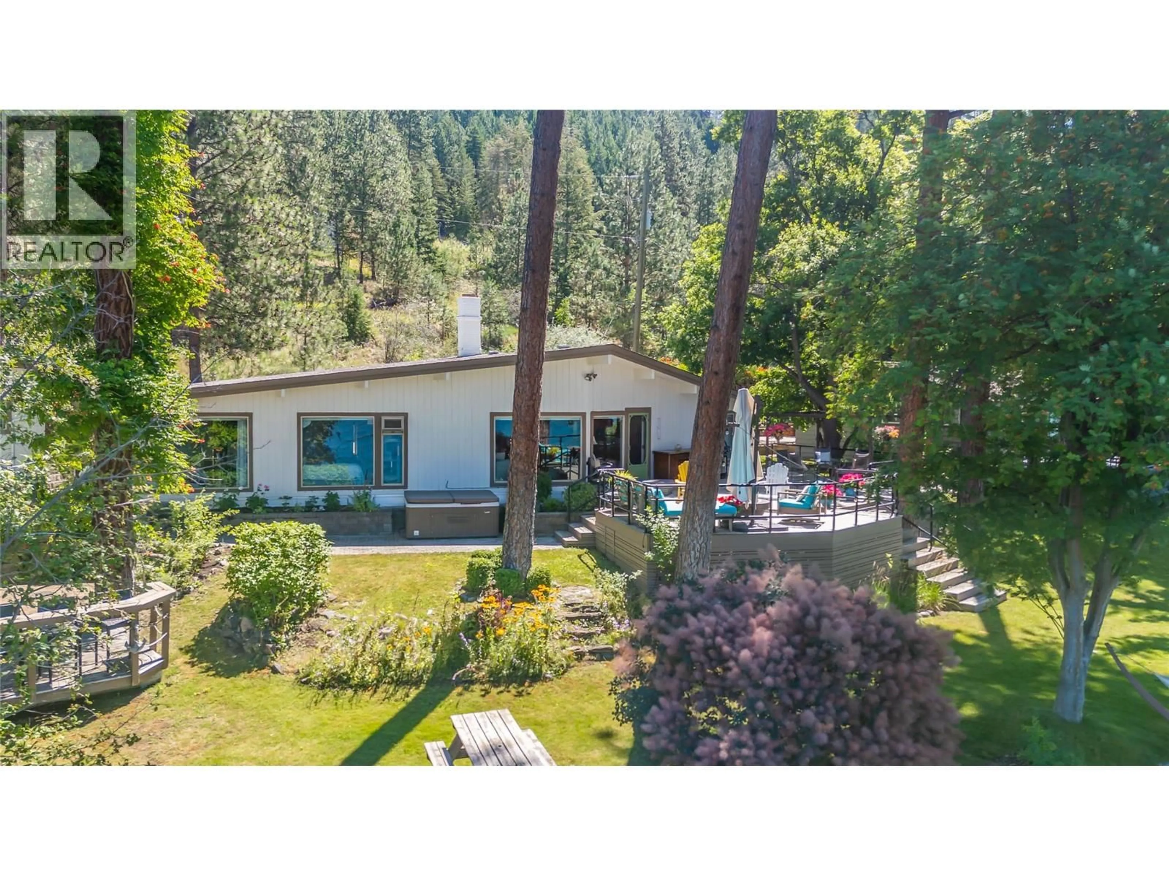 A pic from outside/outdoor area/front of a property/back of a property/a pic from drone, forest/trees view for 12110 TREWHITT ROAD WEST, Lake Country British Columbia V4V2A6