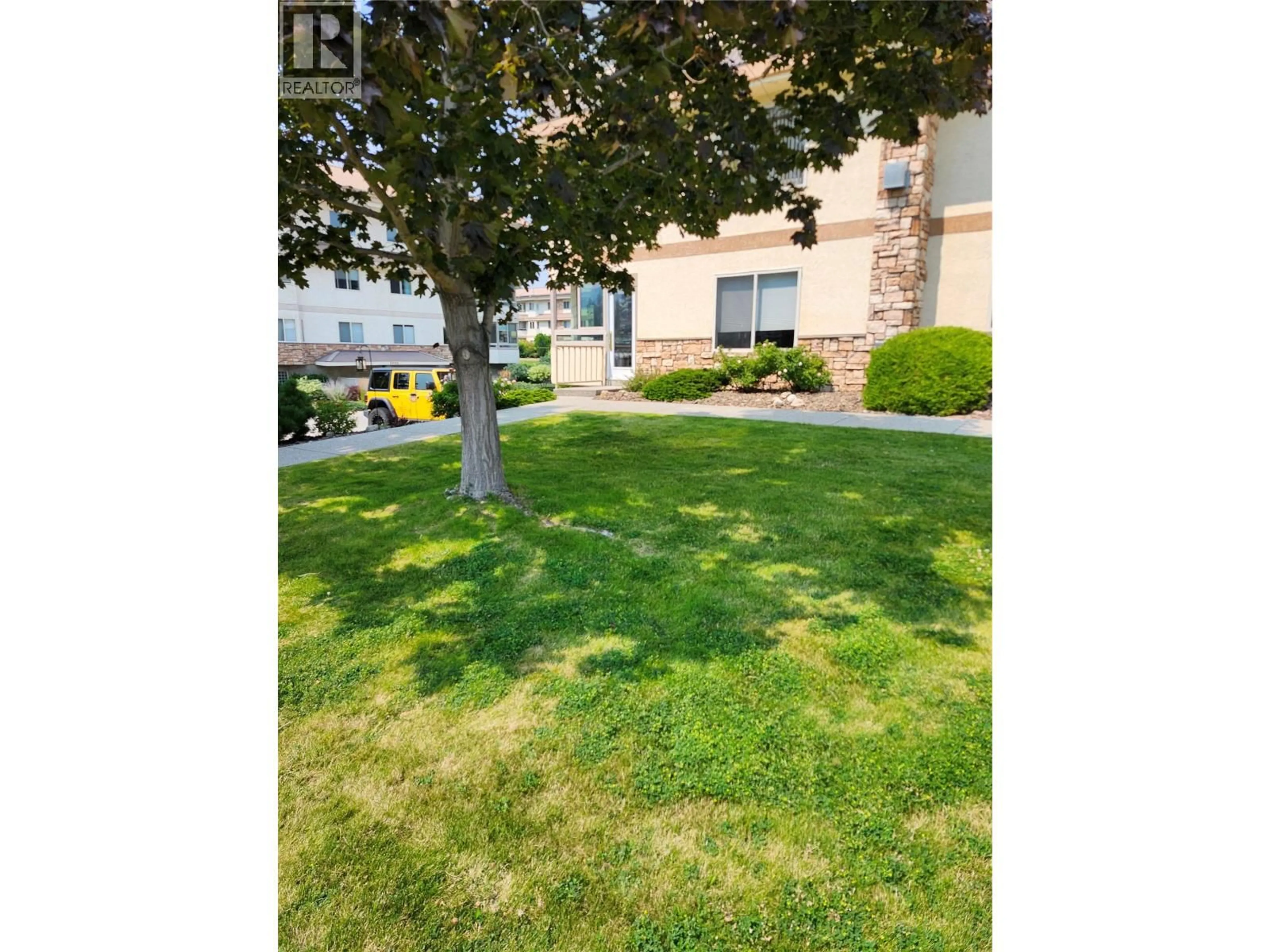 A pic from outside/outdoor area/front of a property/back of a property/a pic from drone, street for 106 - 8416 JUBILEE ROAD EAST, Summerland British Columbia V0H1Z5