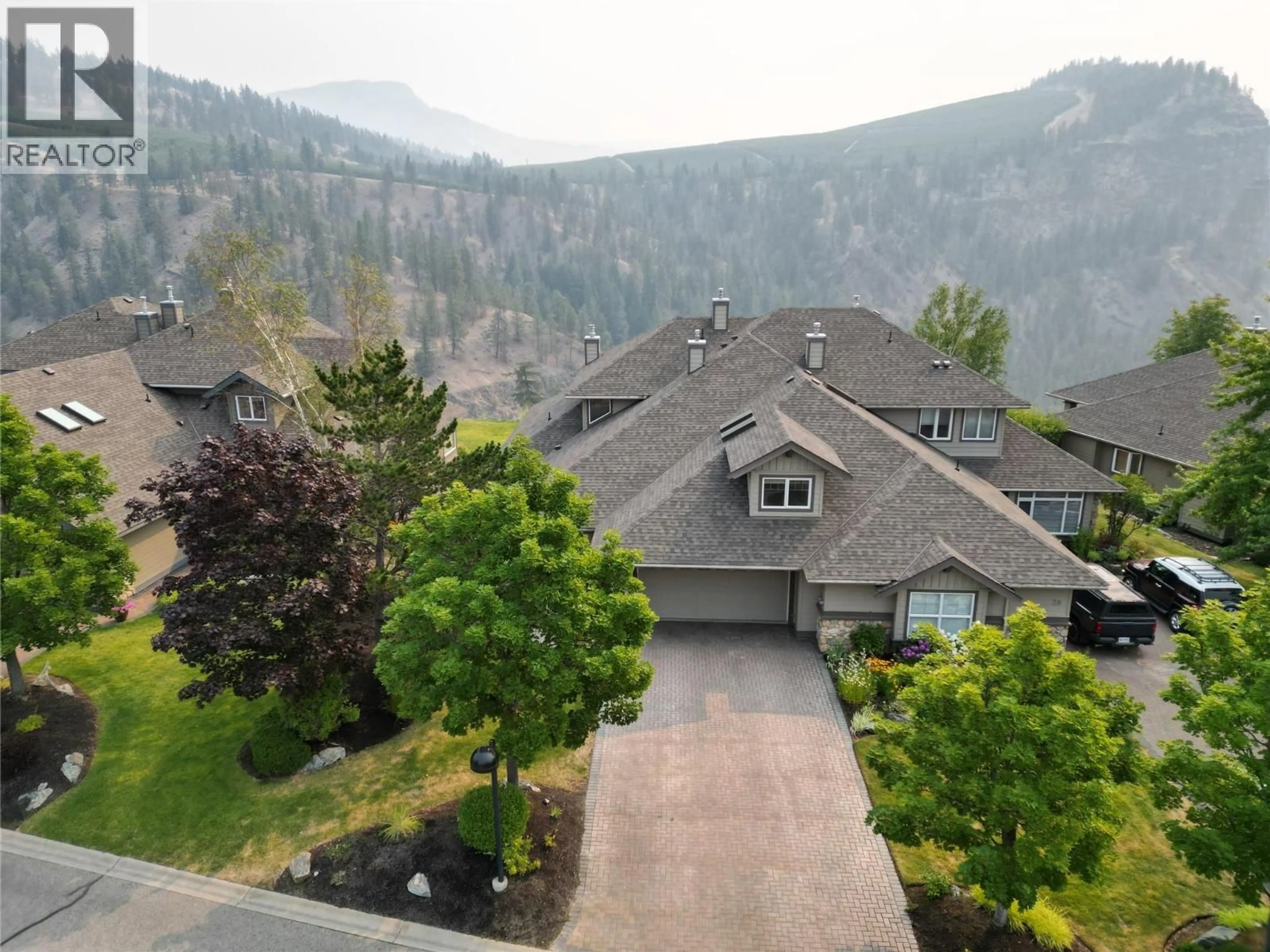 A pic from outside/outdoor area/front of a property/back of a property/a pic from drone, mountain view for 29 - 3800 GALLAGHER'S PINNACLE WAY, Kelowna British Columbia V1W3Z8