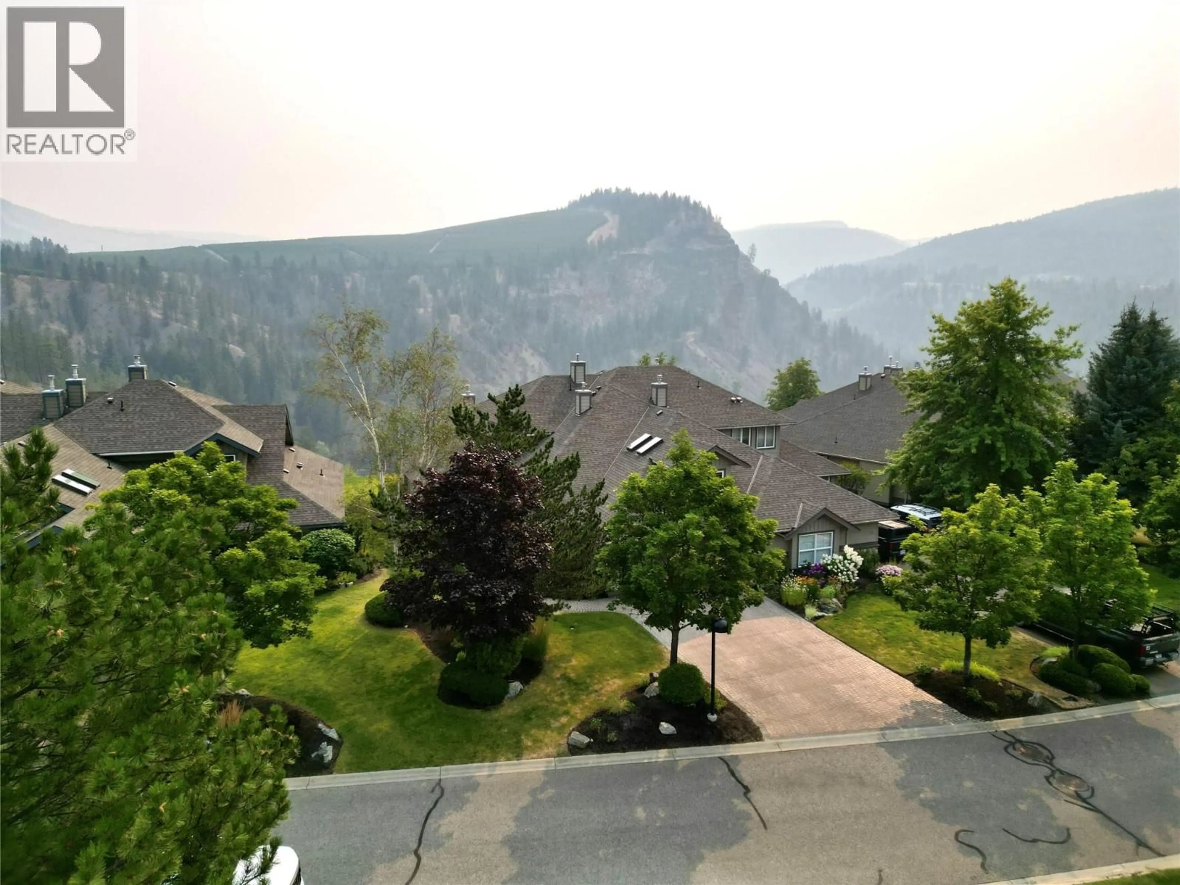 A pic from outside/outdoor area/front of a property/back of a property/a pic from drone, mountain view for 29 - 3800 GALLAGHER'S PINNACLE WAY, Kelowna British Columbia V1W3Z8