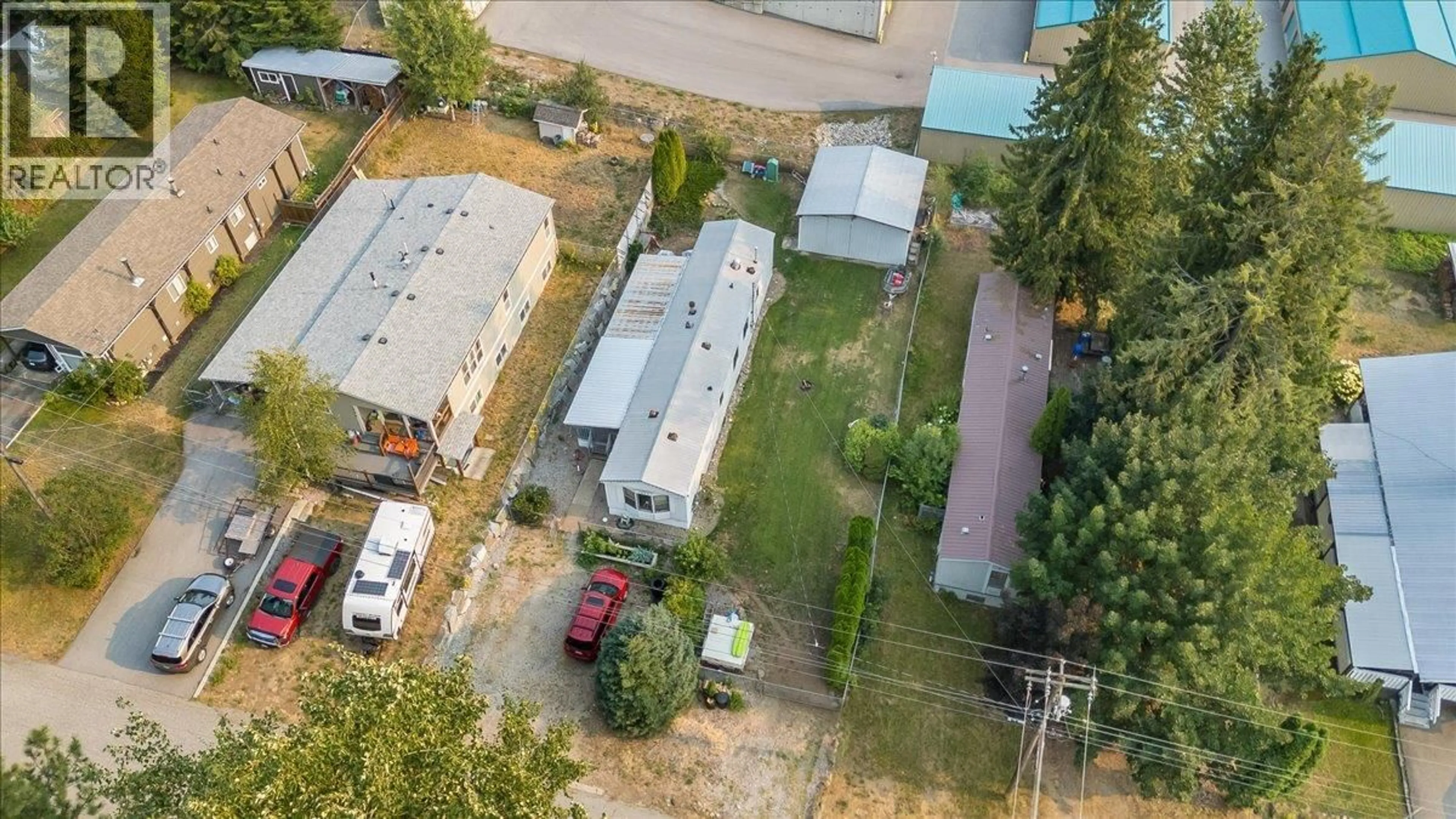 A pic from outside/outdoor area/front of a property/back of a property/a pic from drone, street for 1015 GARDEN ROAD, South Slocan British Columbia V0G2G1