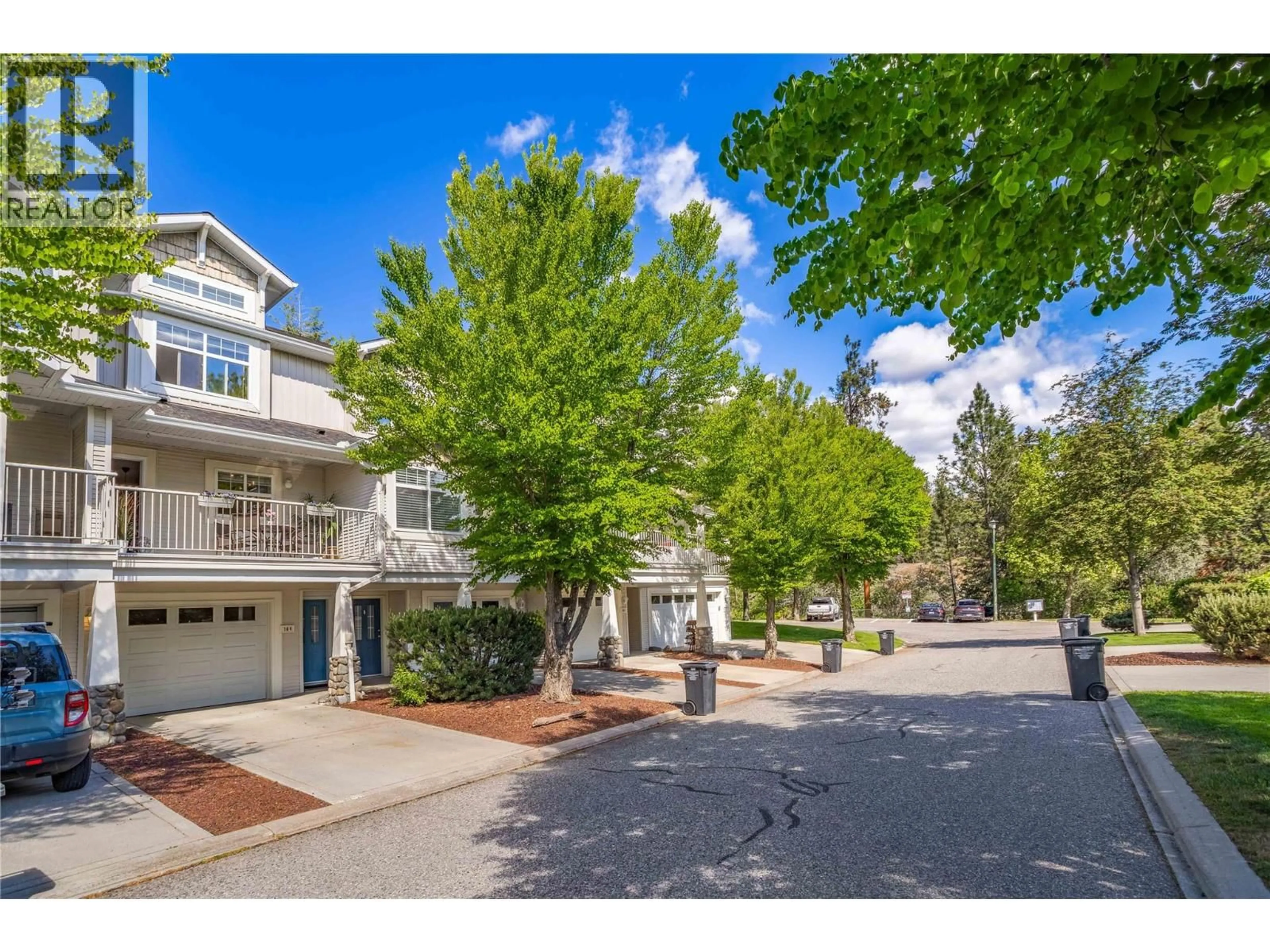 A pic from outside/outdoor area/front of a property/back of a property/a pic from drone, street for 104 - 3825 GLEN CANYON DRIVE, West Kelowna British Columbia V4T2T4