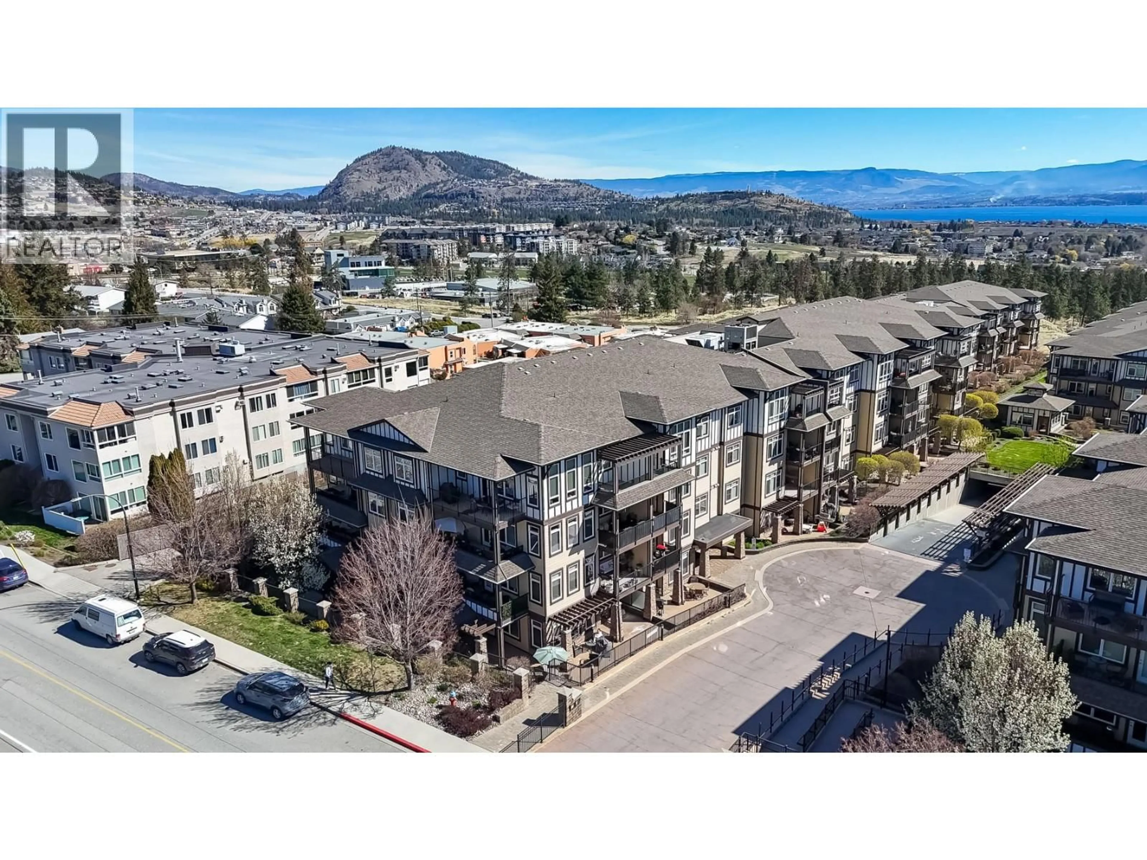 A pic from outside/outdoor area/front of a property/back of a property/a pic from drone, mountain view for 1113 - 3833 BROWN ROAD, West Kelowna British Columbia V4T2J3