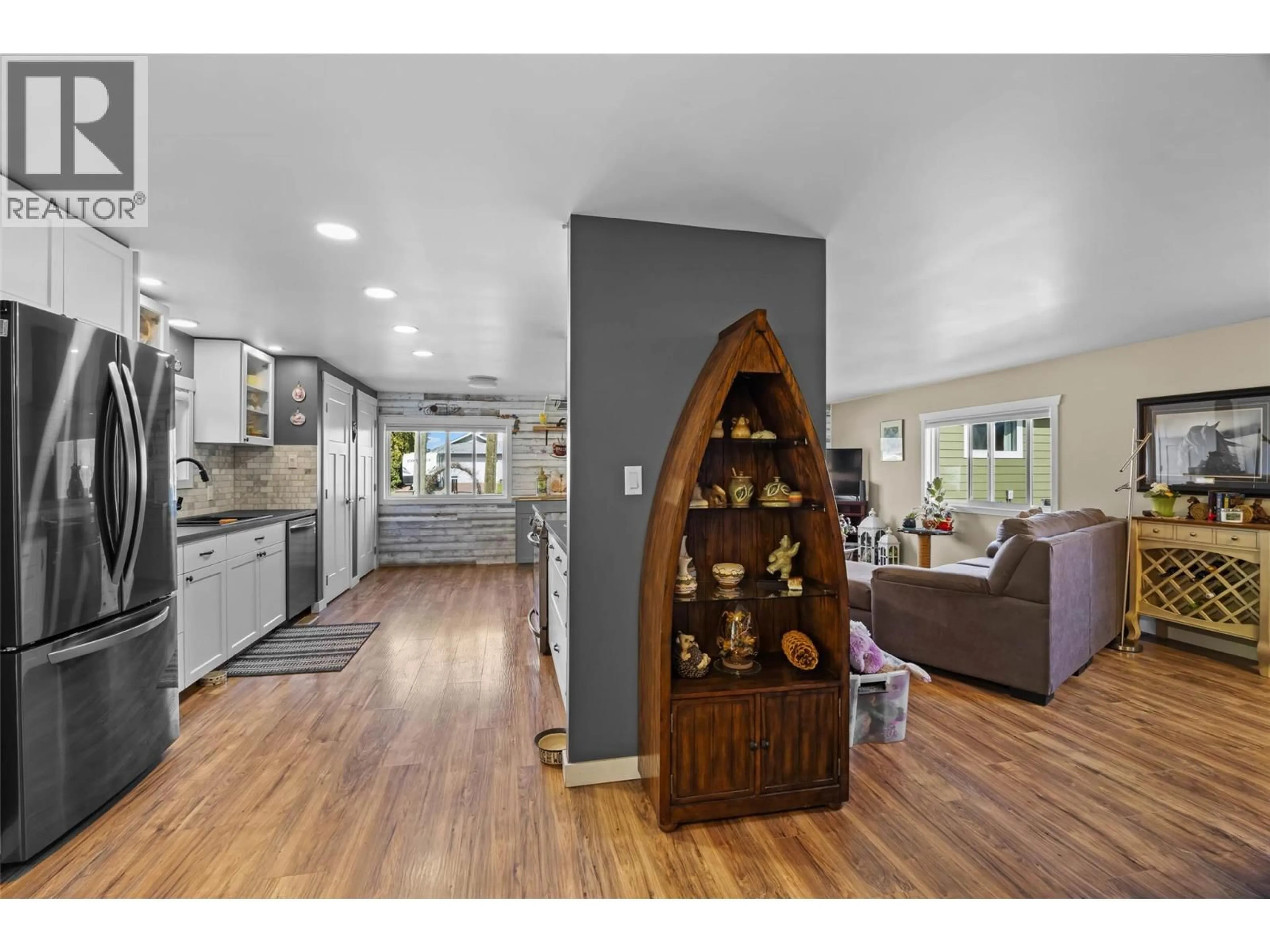 Open concept kitchen, wood/laminate floor for 518 PINE STREET, Chase British Columbia V0E1M0