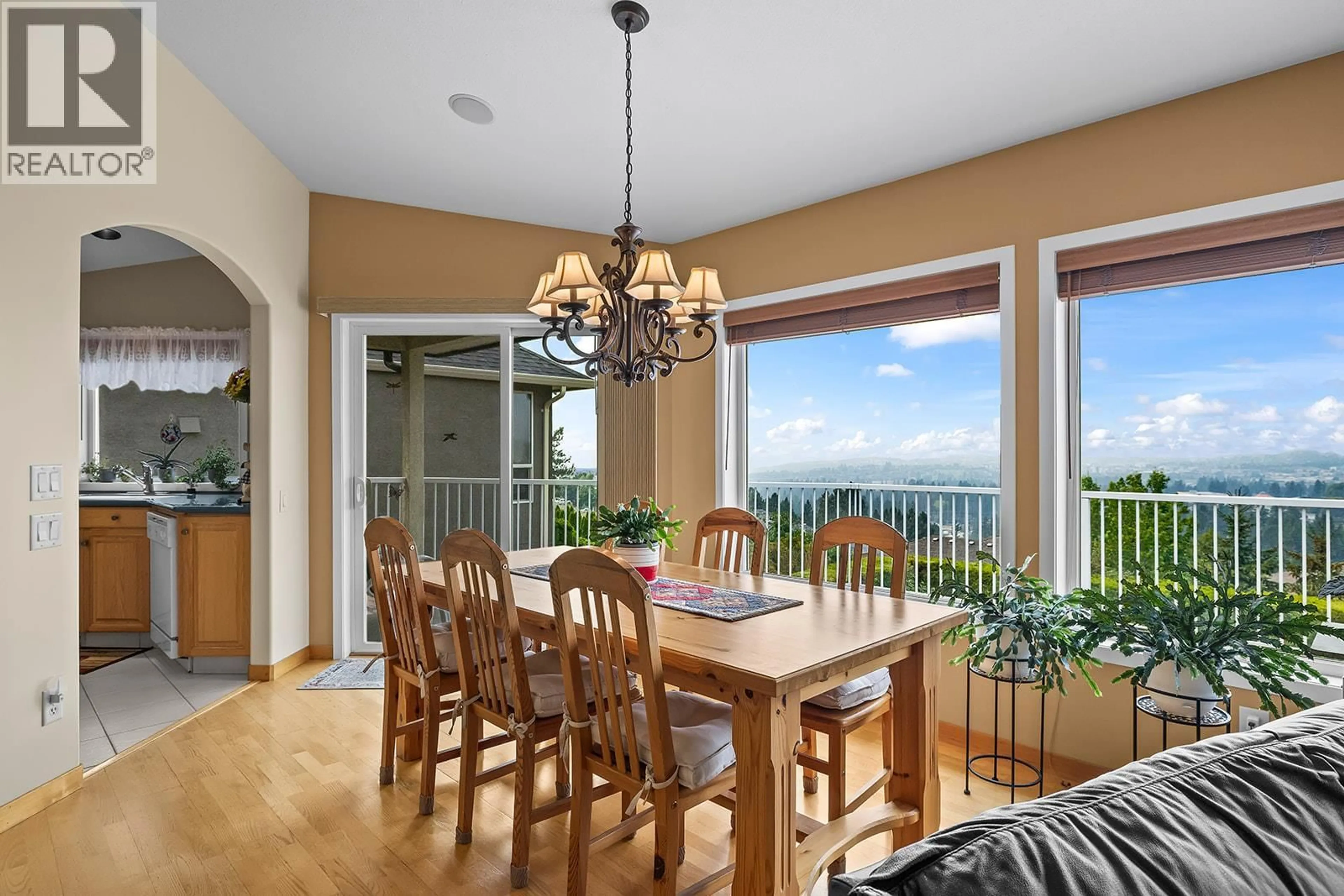 Dining room, wood/laminate floor for 3388 RIDGE BOULEVARD, West Kelowna British Columbia V4Y2V6