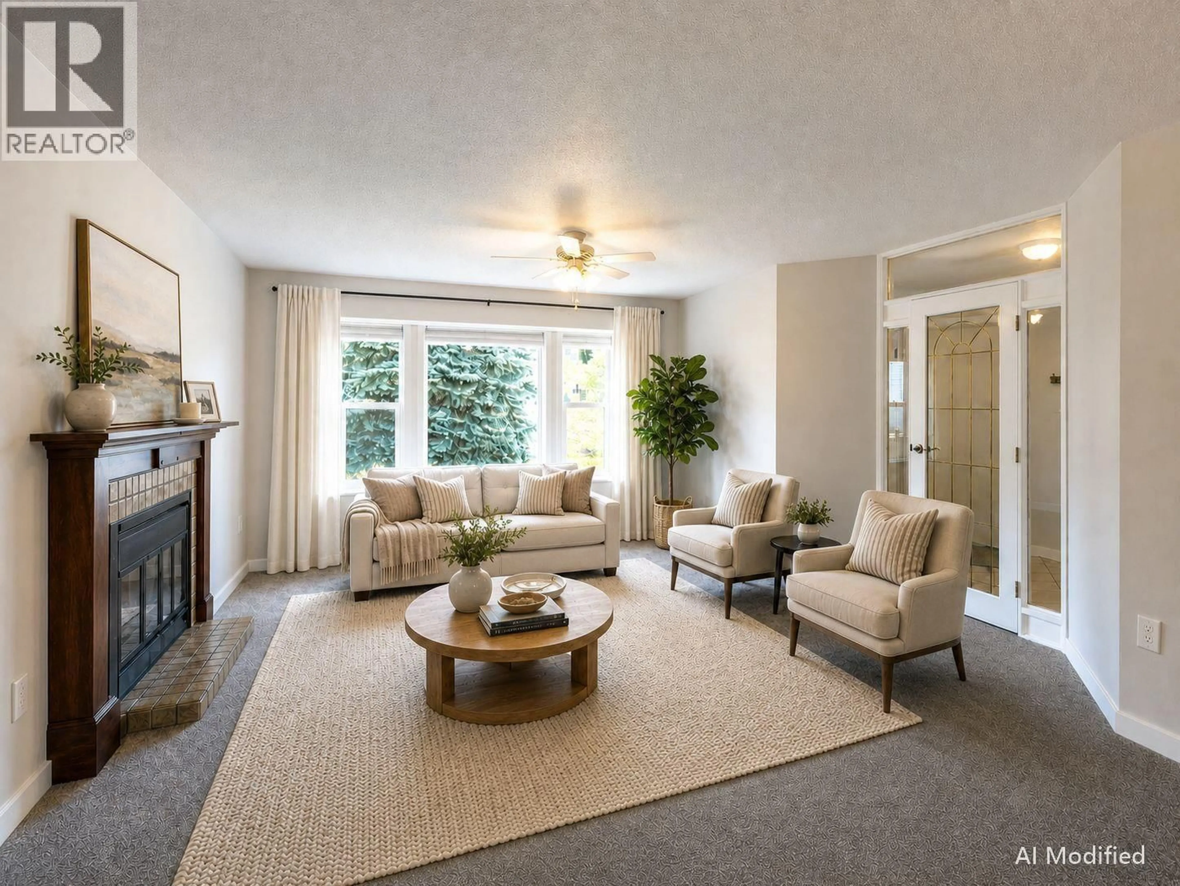 Living room with furniture, carpet floor for 211 15 STREET NORTHEAST, Salmon Arm British Columbia V1E1N5