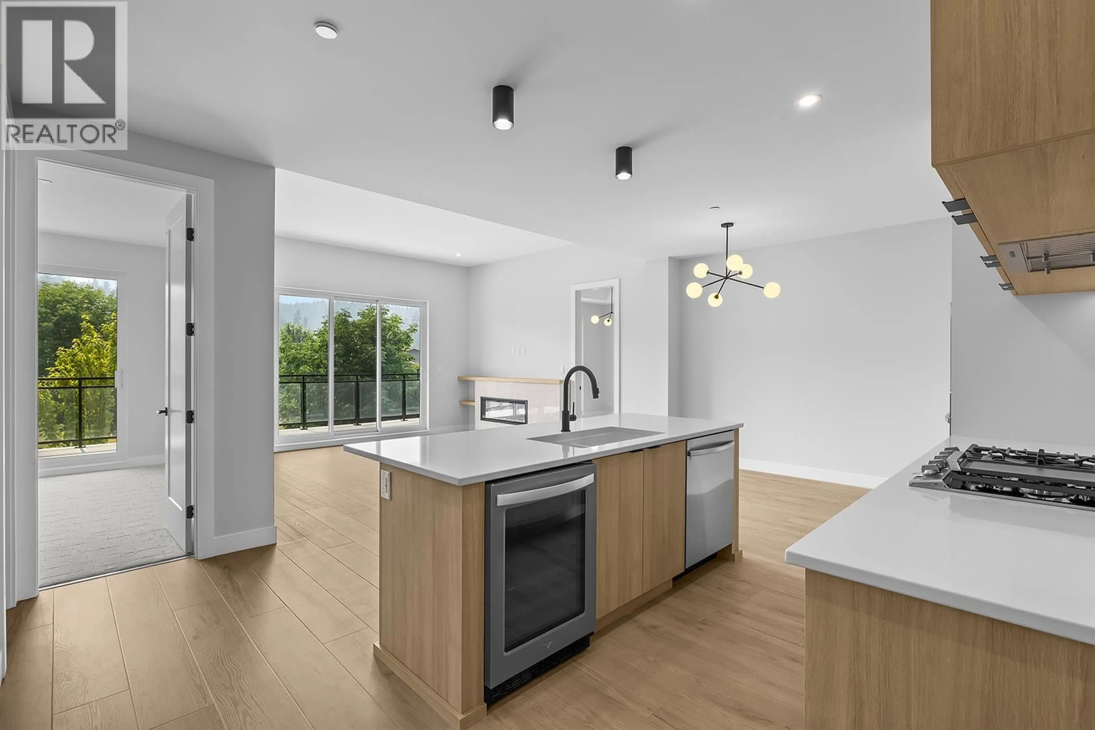Open concept kitchen, unknown for 205 - 75 PREDATOR RIDGE DRIVE, Vernon British Columbia V1H1G4