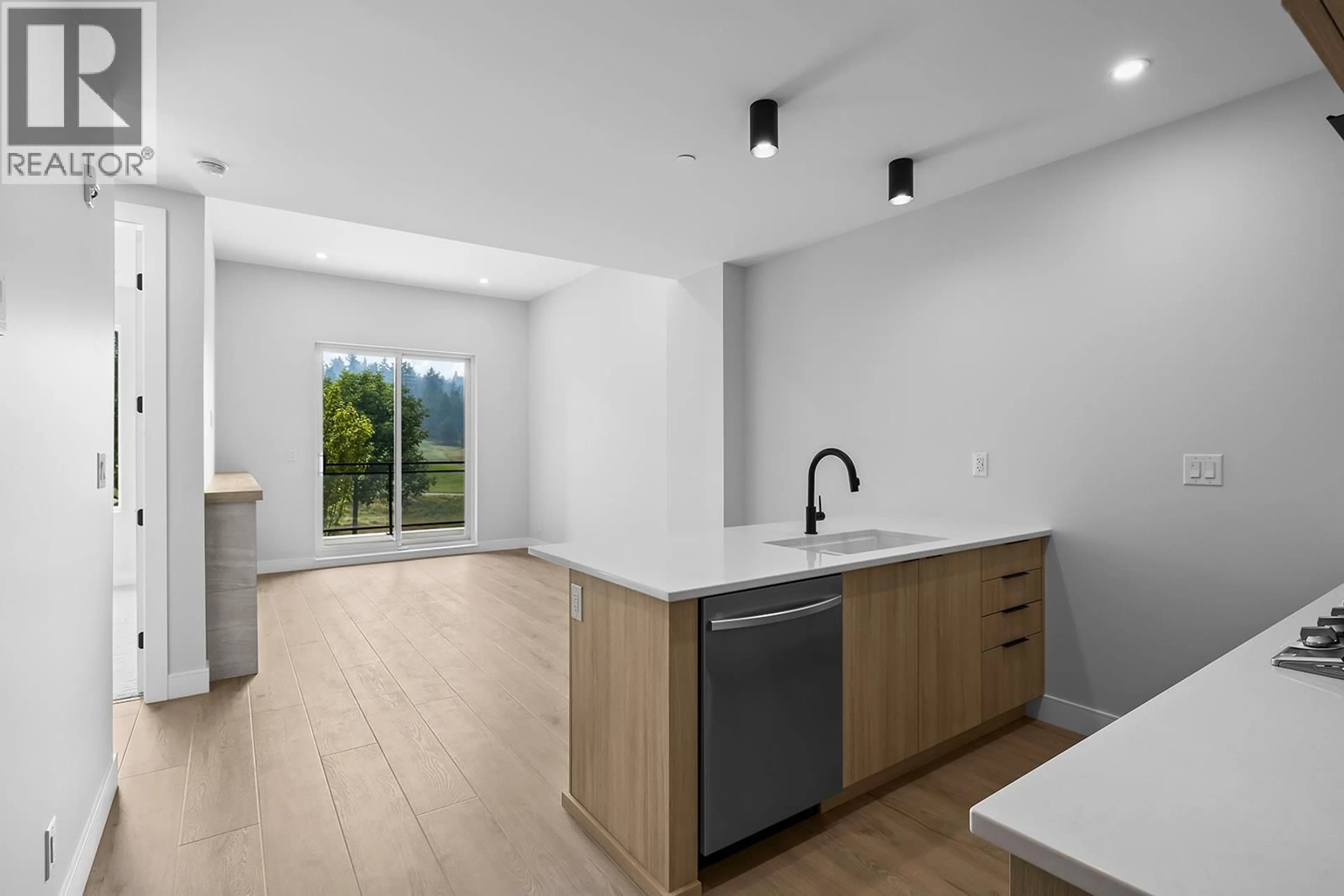 Open concept kitchen, unknown for 208 - 75 PREDATOR RIDGE DRIVE, Vernon British Columbia V1H1G4
