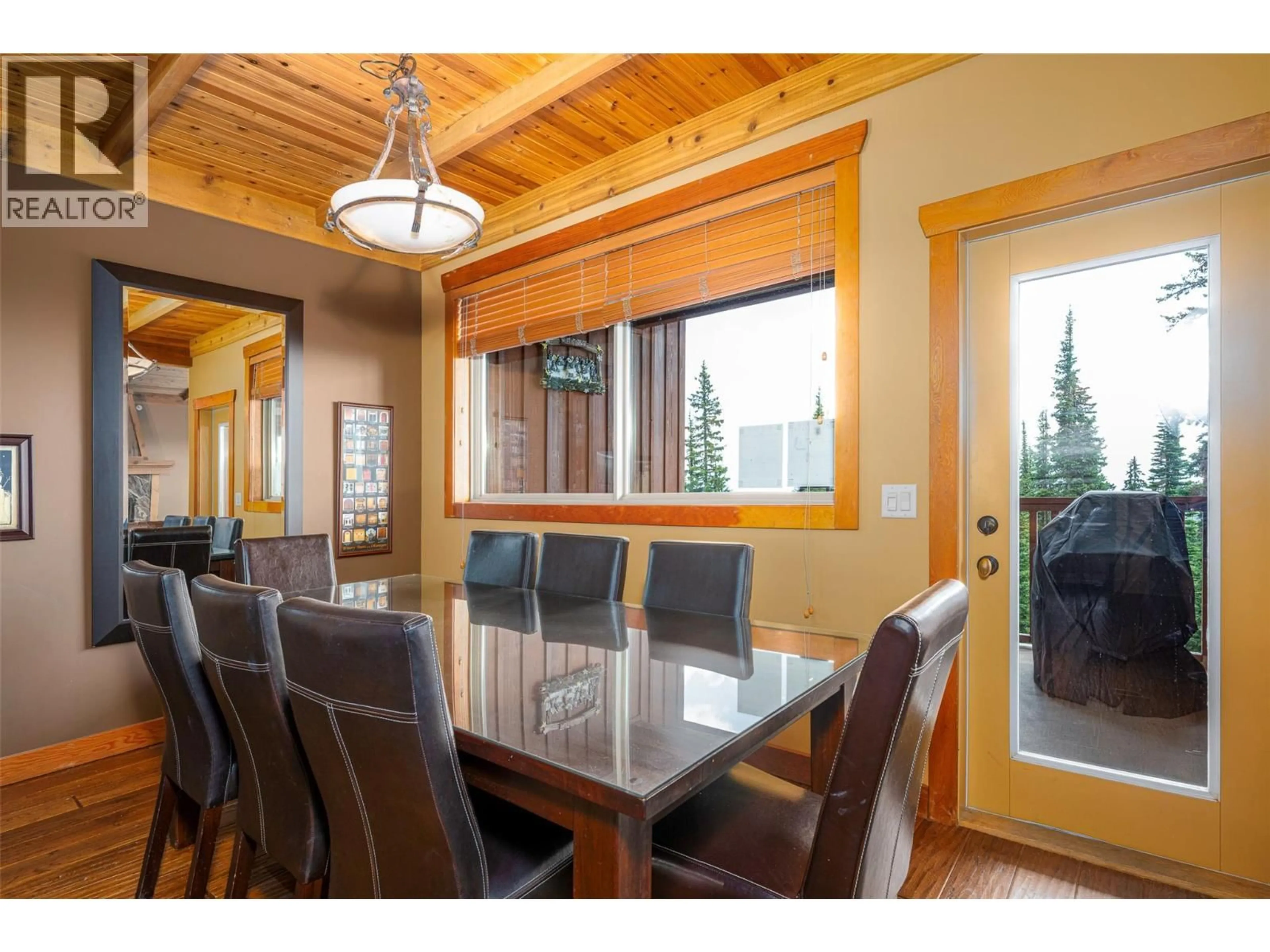 Dining room, wood/laminate floor for 205 - 250 FEATHERTOP WAY, Big White British Columbia V1P1T4