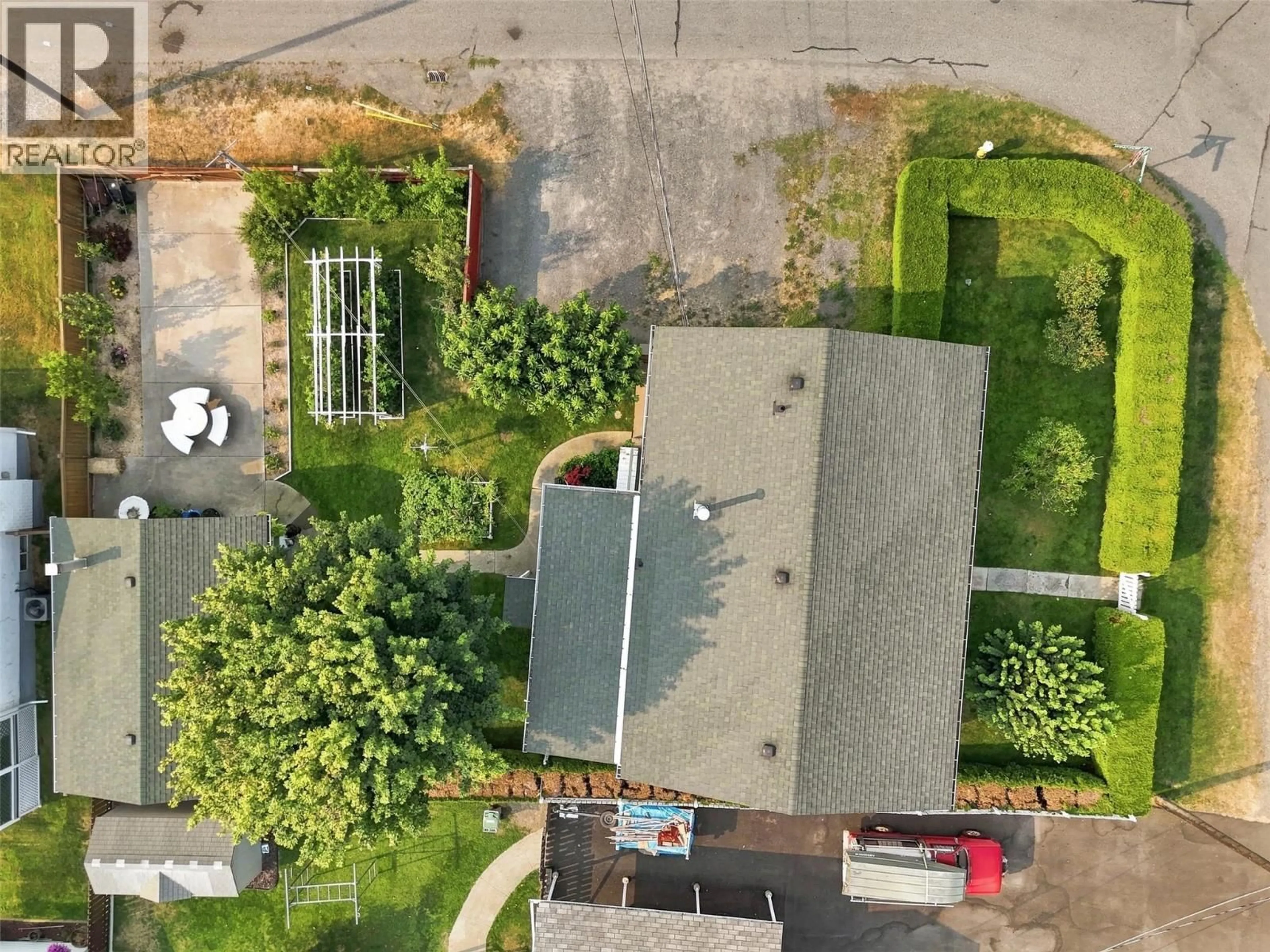 A pic from outside/outdoor area/front of a property/back of a property/a pic from drone, street for 1291 SCHUBERT DRIVE, Kamloops British Columbia V2B2G8