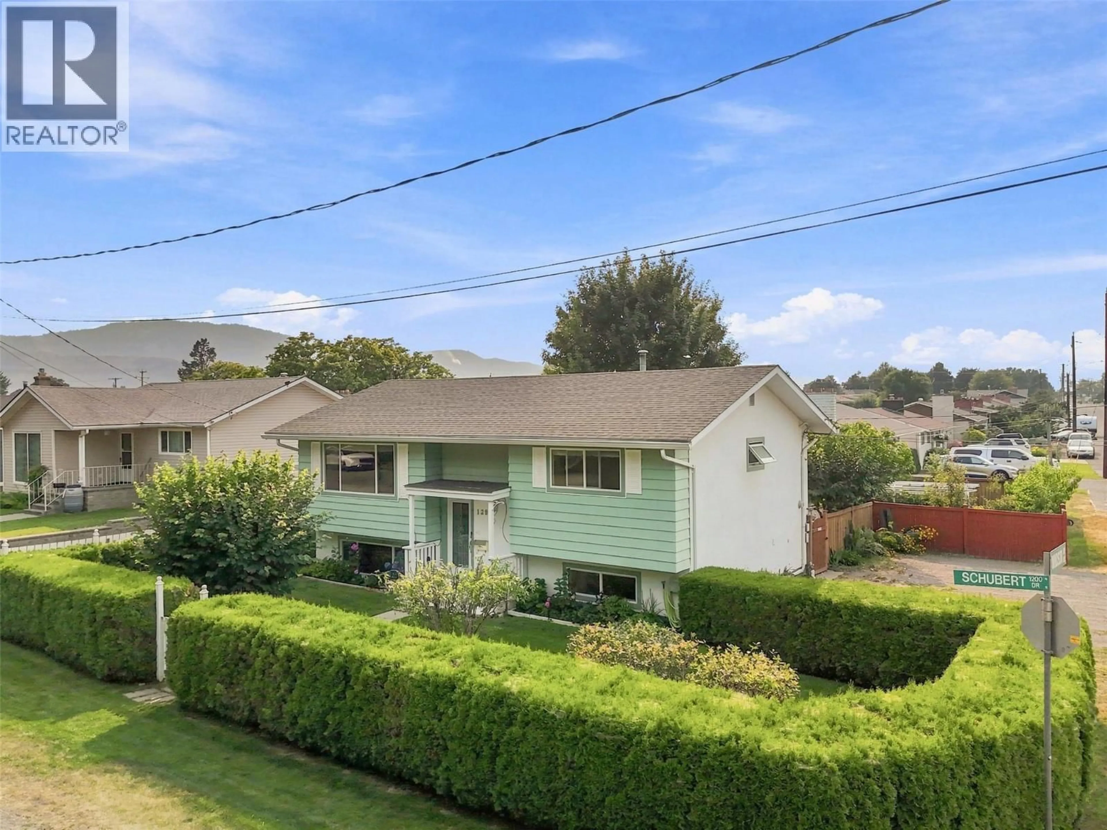 A pic from outside/outdoor area/front of a property/back of a property/a pic from drone, street for 1291 SCHUBERT DRIVE, Kamloops British Columbia V2B2G8