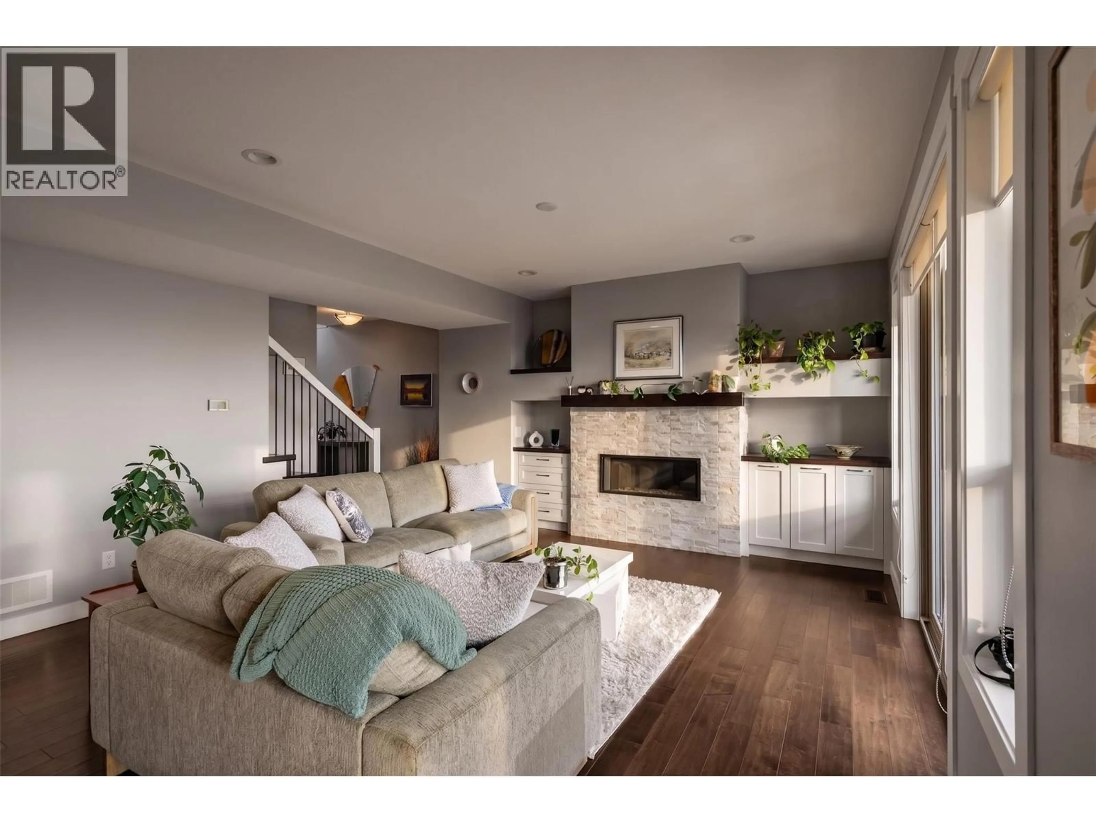 Living room with furniture, wood/laminate floor for 34 - 1870 ROSEALEE LANE, West Kelowna British Columbia V1Z4E5