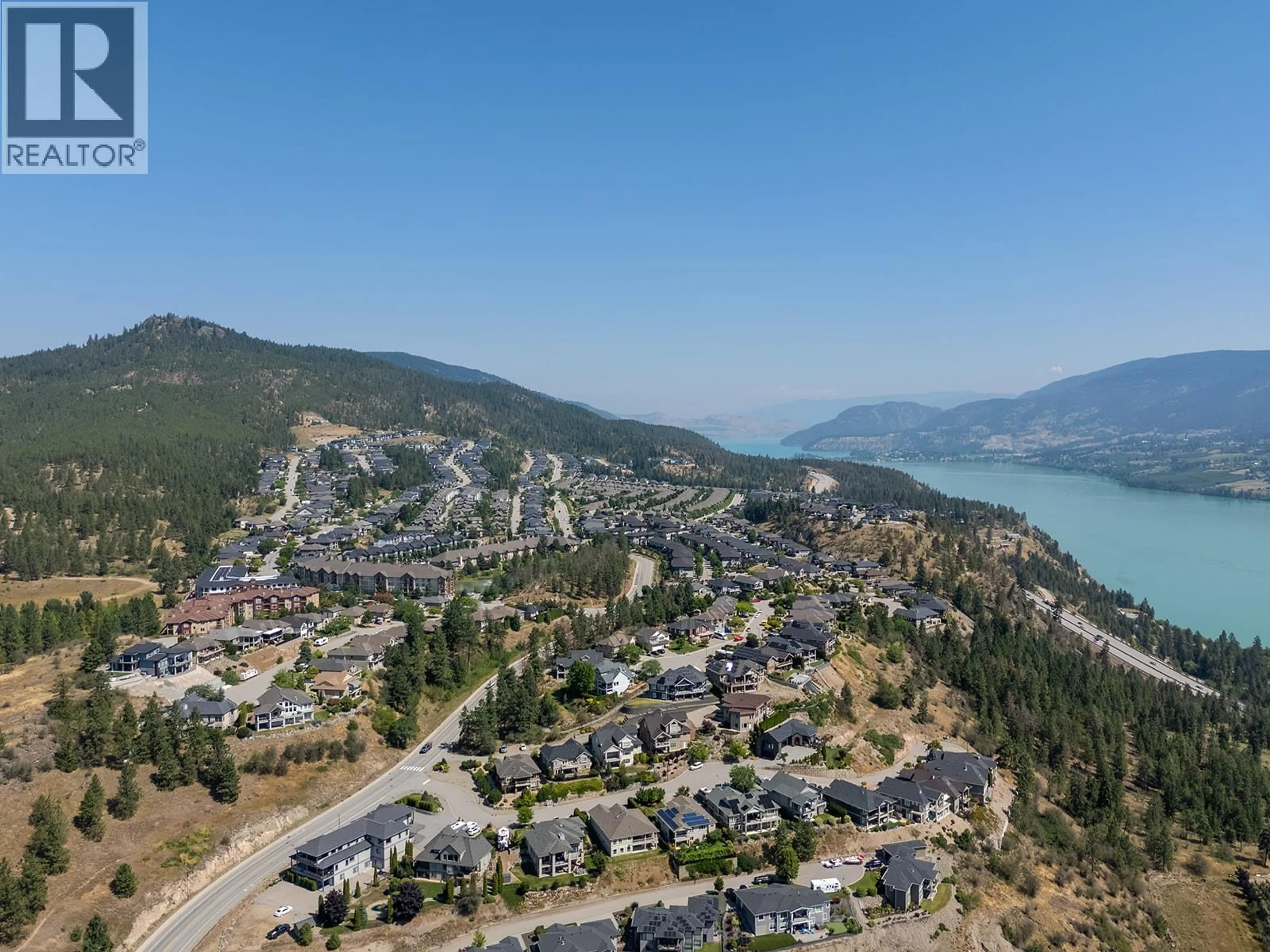 A pic from outside/outdoor area/front of a property/back of a property/a pic from drone, mountain view for 12905 LAKE HILL LANE, Lake Country British Columbia V4V2S9