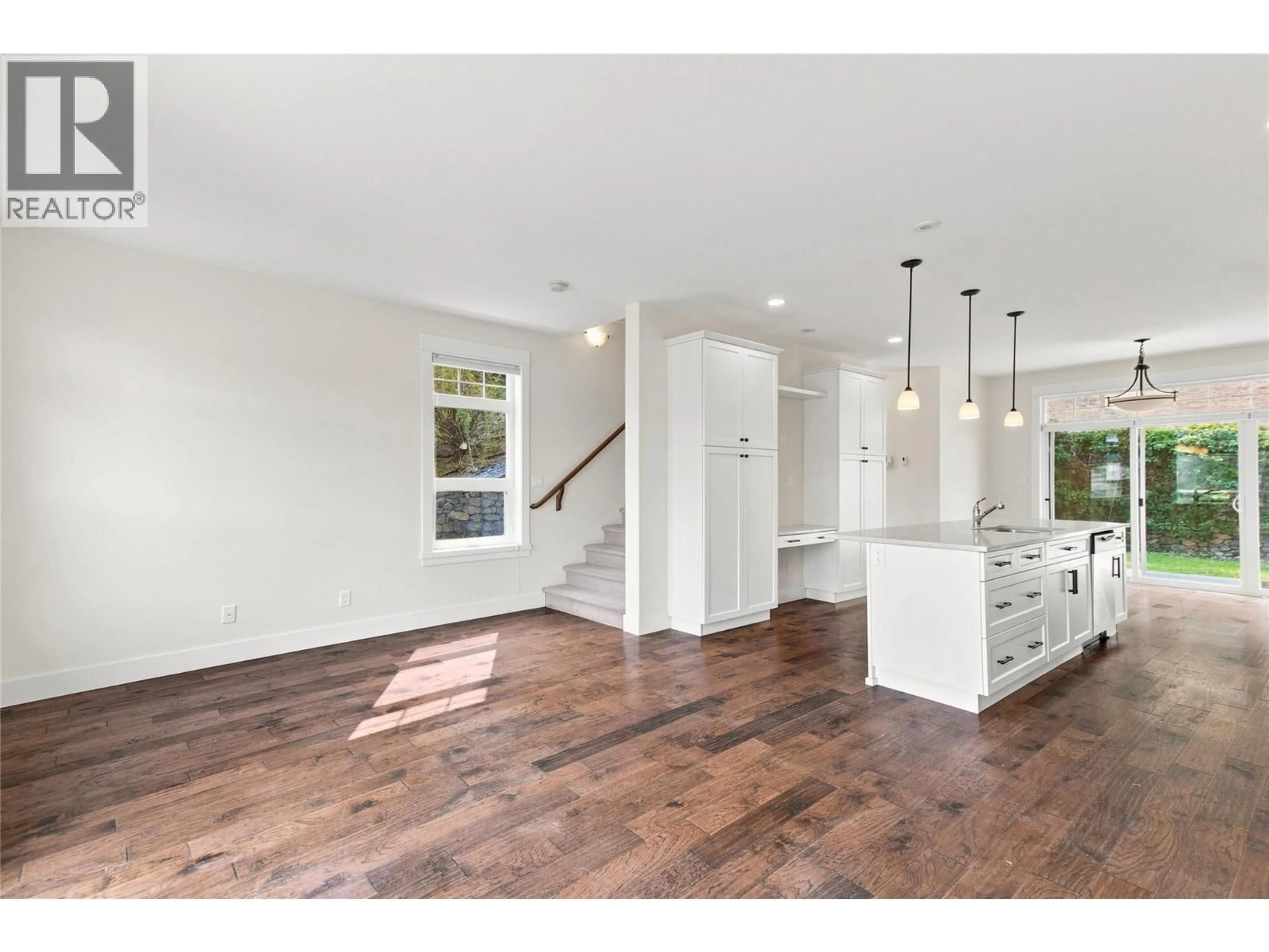 Open concept kitchen, wood/laminate floor for 145 ST PAUL STREET, Kamloops British Columbia V2C2J1