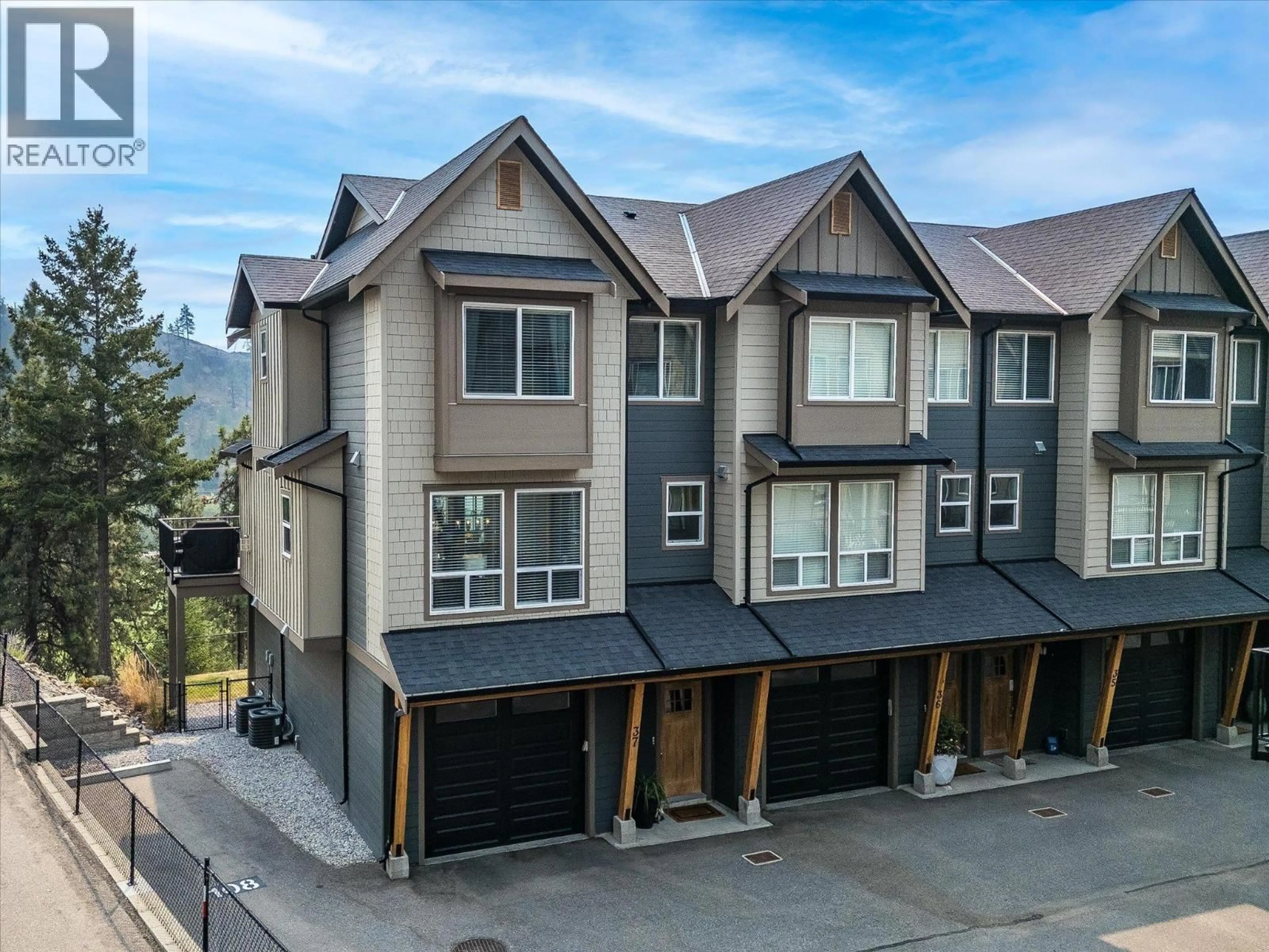 A pic from outside/outdoor area/front of a property/back of a property/a pic from drone, street for 37 - 2490 TUSCANY DRIVE, West Kelowna British Columbia V4T3M4