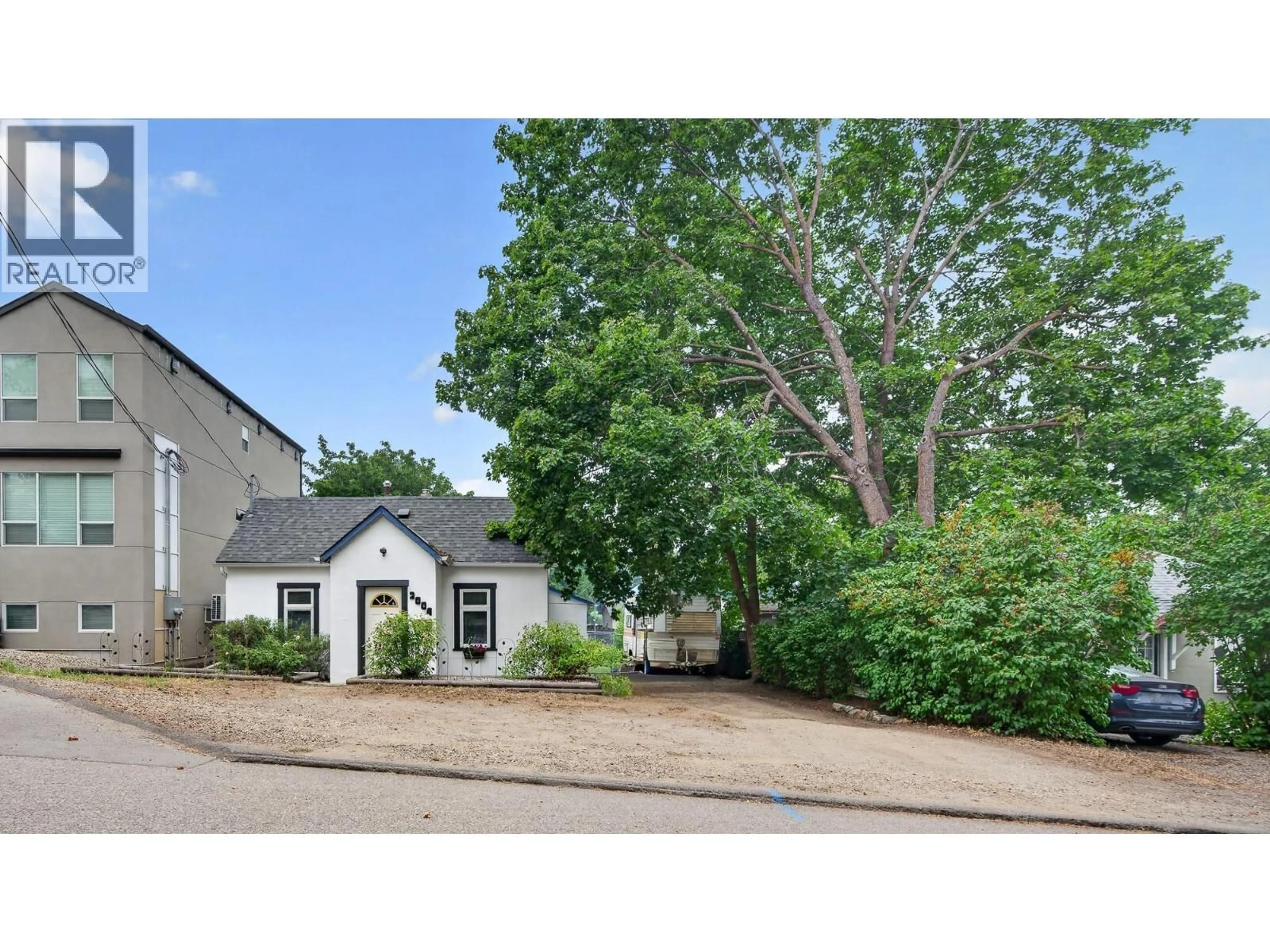A pic from outside/outdoor area/front of a property/back of a property/a pic from drone, street for 2004 33 STREET, Vernon British Columbia V1T5R6