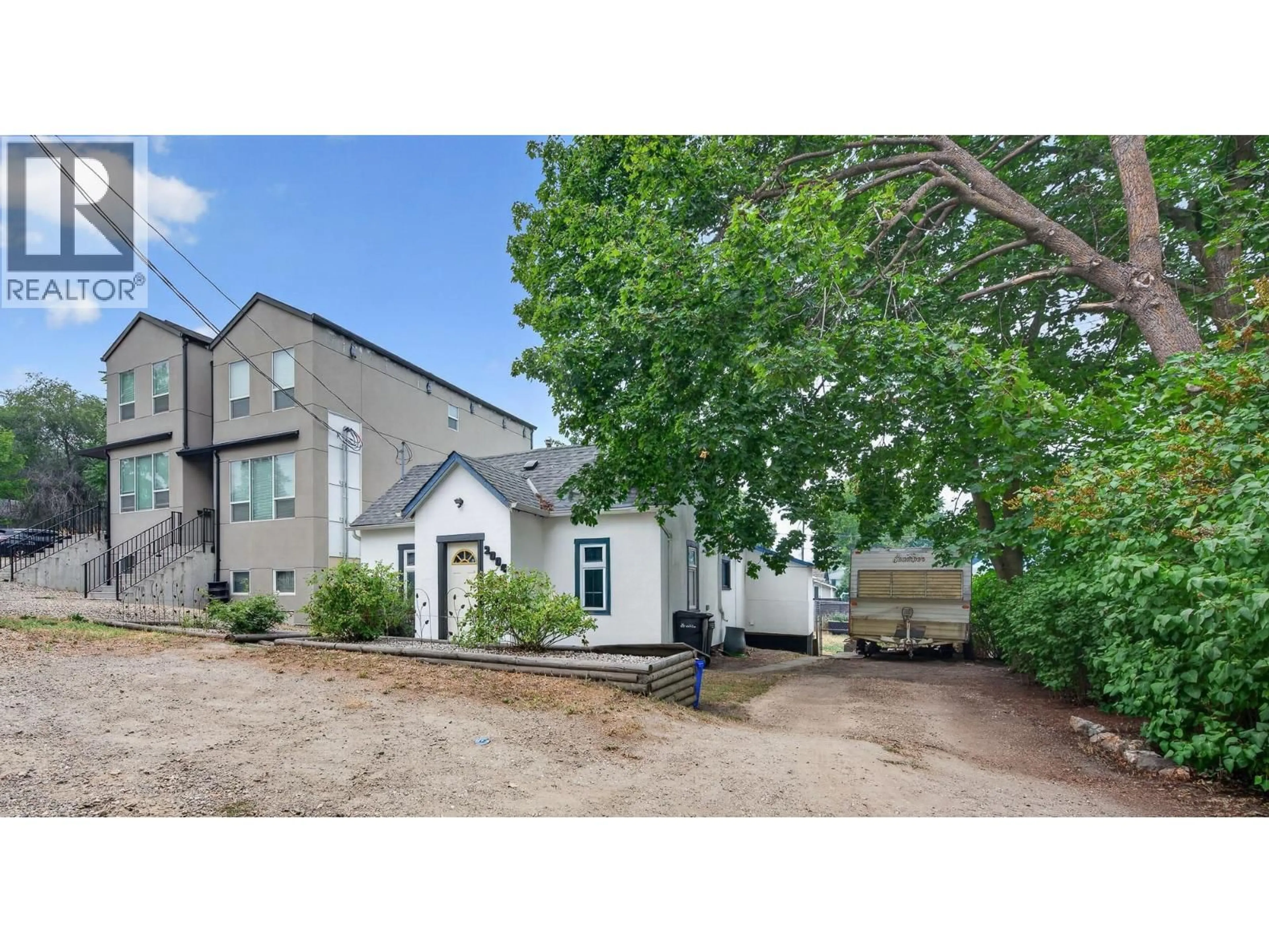 A pic from outside/outdoor area/front of a property/back of a property/a pic from drone, street for 2004 33 STREET, Vernon British Columbia V1T5R6