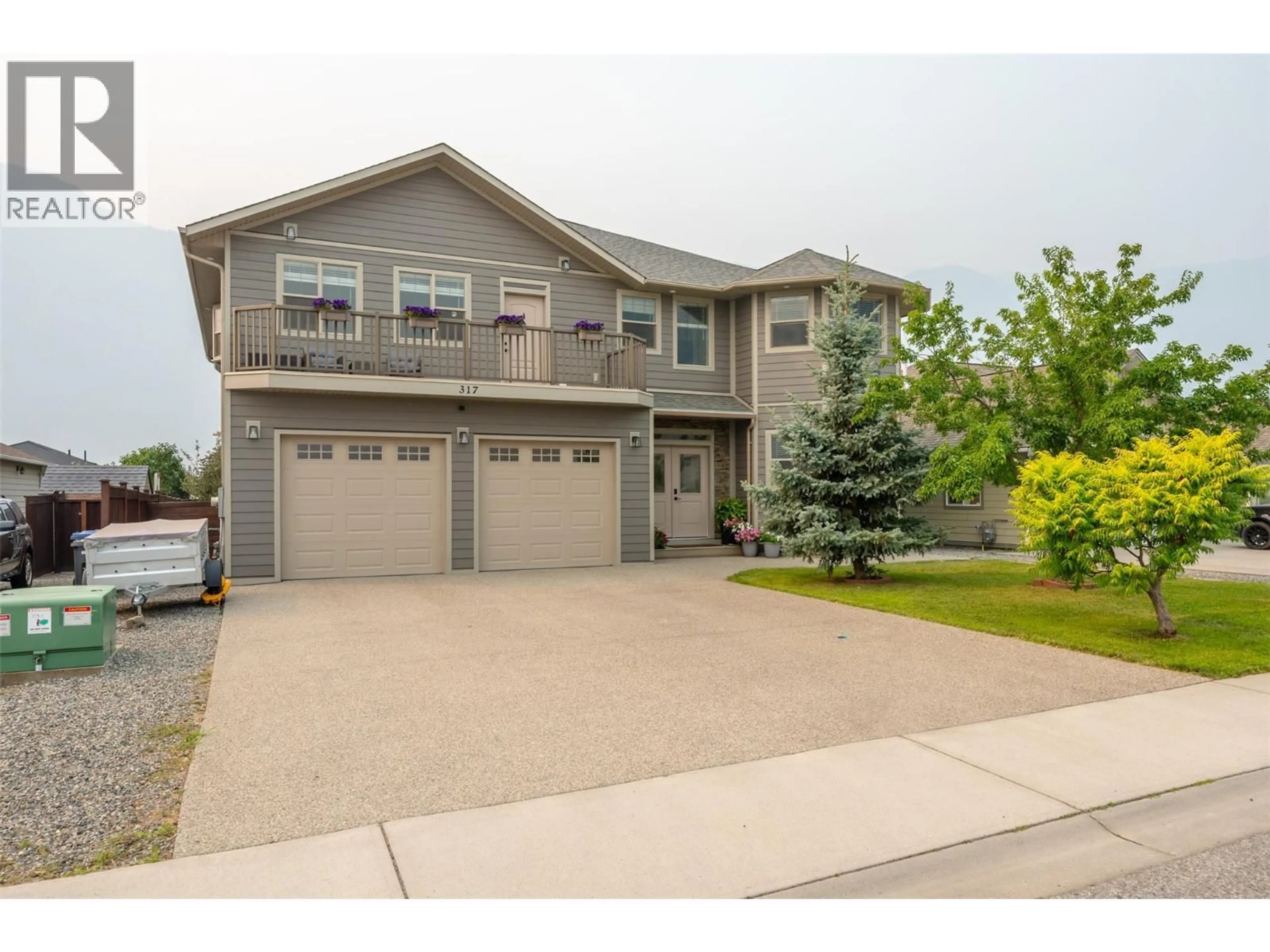 Home with vinyl exterior material, street for 317 2ND AVENUE, Keremeos British Columbia V0X1N2