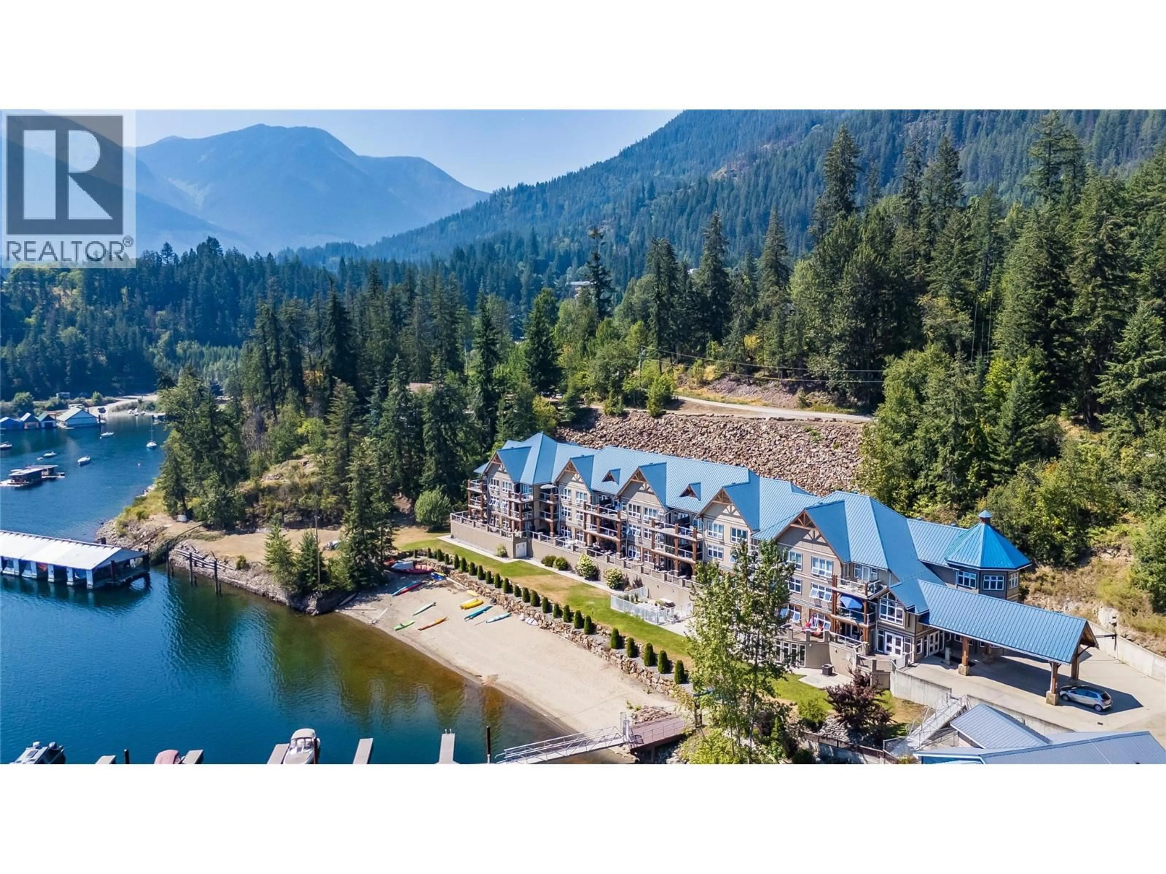 A pic from outside/outdoor area/front of a property/back of a property/a pic from drone, water/lake/river/ocean view for 209 - 550 RAINBOW DRIVE, Kaslo British Columbia V0G1M0