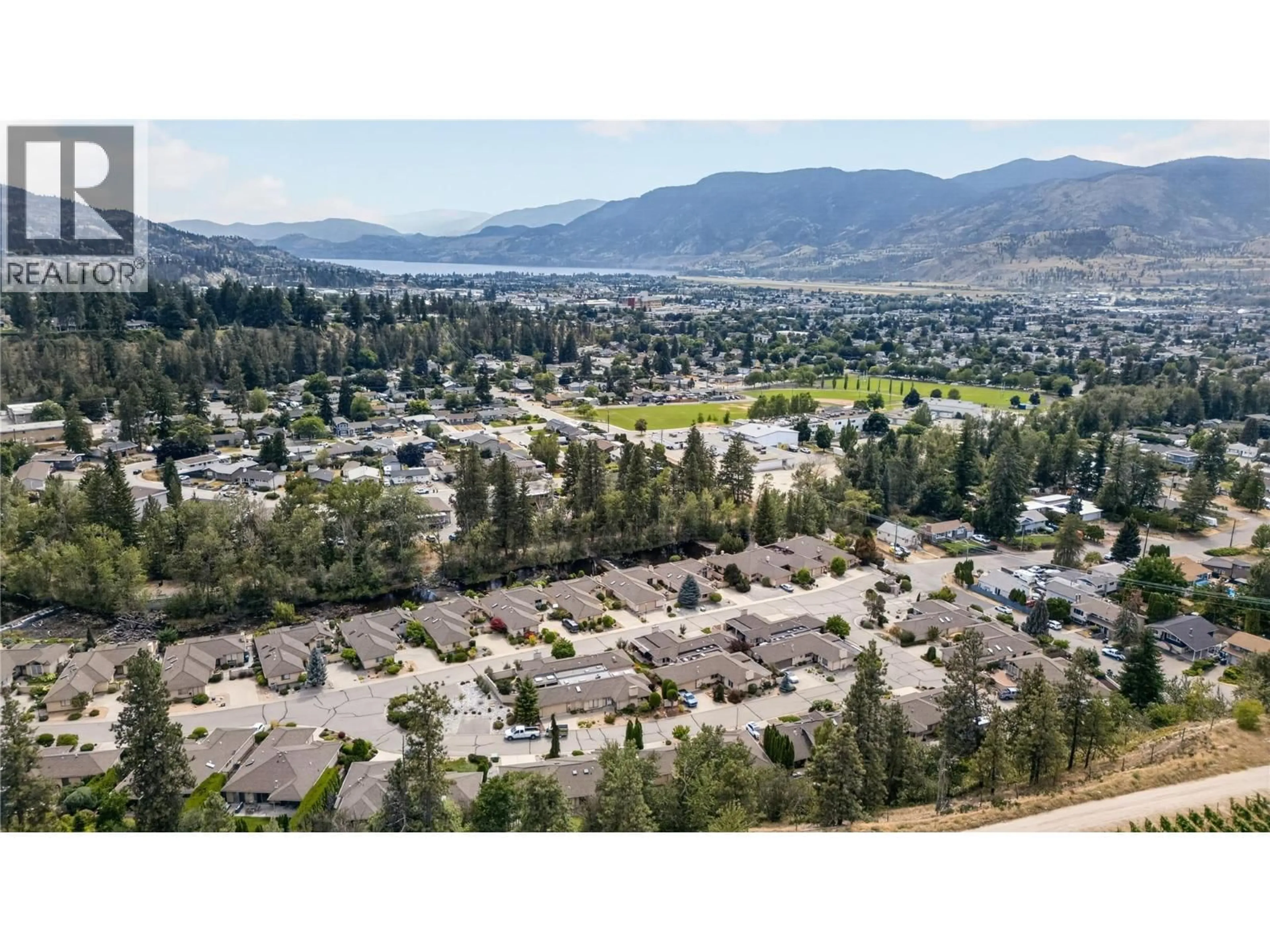 A pic from outside/outdoor area/front of a property/back of a property/a pic from drone, mountain view for 213 - 102 FORESTBROOK PLACE, Penticton British Columbia V2A7N4