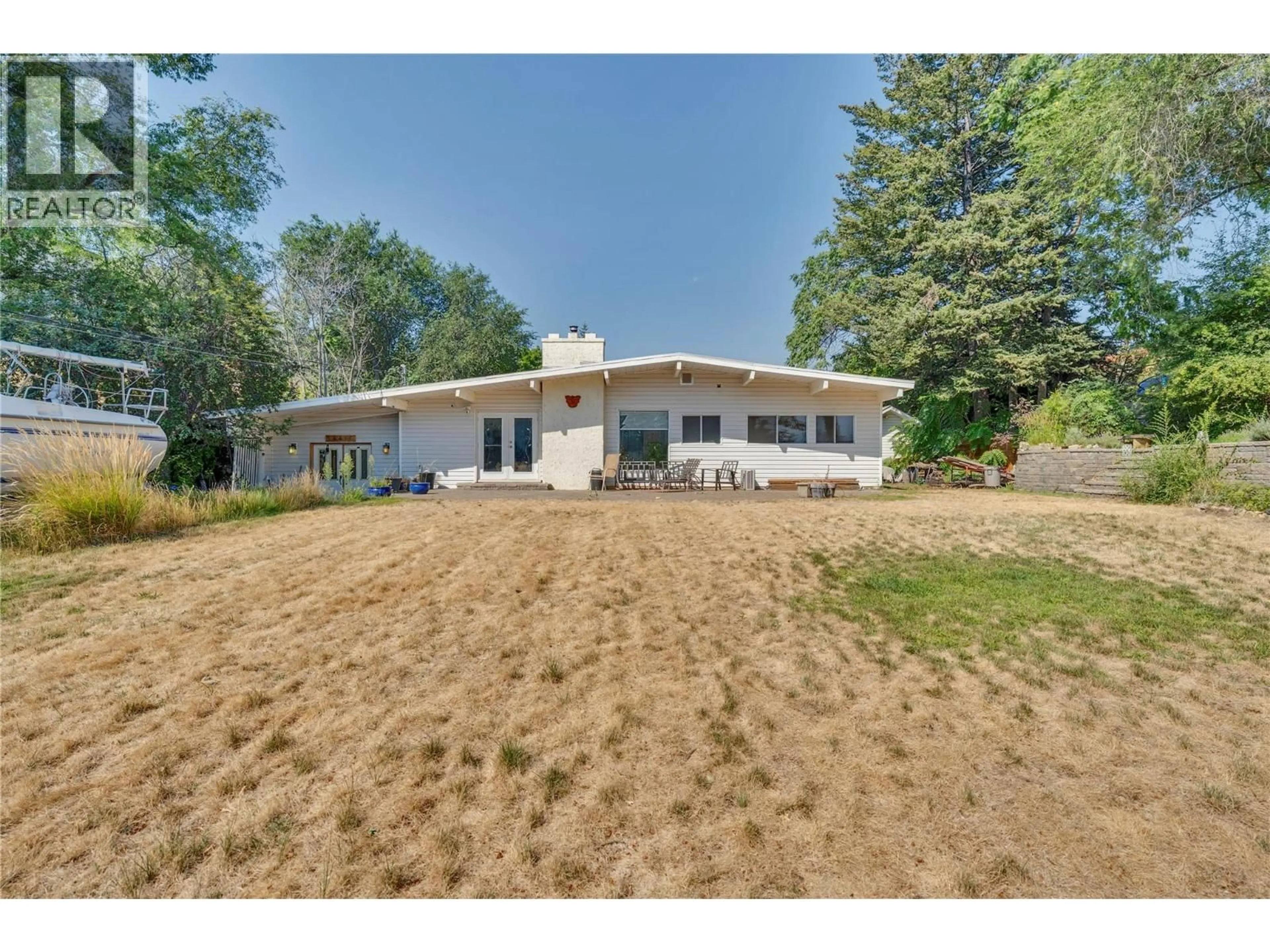 A pic from outside/outdoor area/front of a property/back of a property/a pic from drone, unknown for 14416 FISHER CLOSE, Summerland British Columbia V0H1Z0