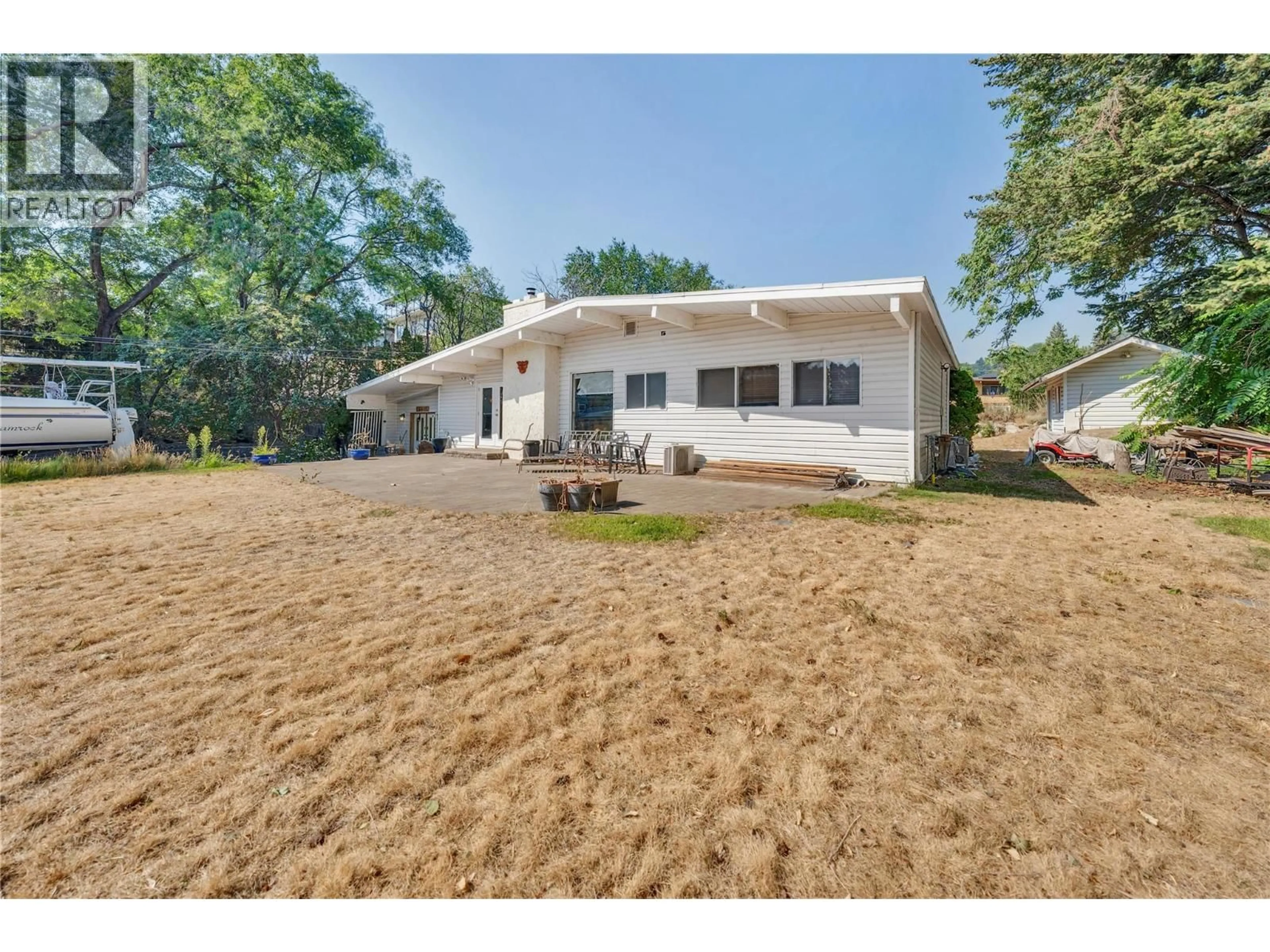 A pic from outside/outdoor area/front of a property/back of a property/a pic from drone, unknown for 14416 FISHER CLOSE, Summerland British Columbia V0H1Z0