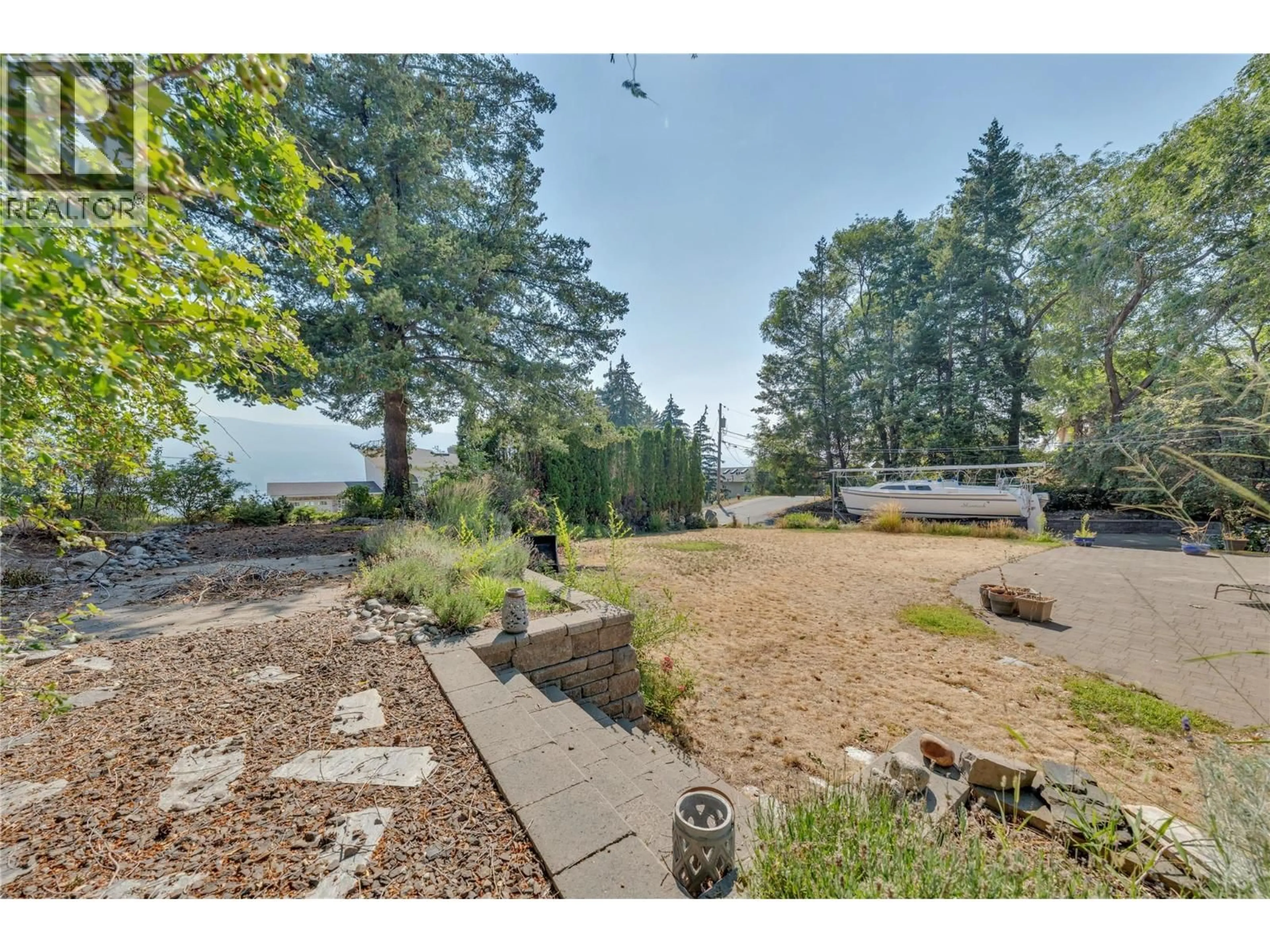 A pic from outside/outdoor area/front of a property/back of a property/a pic from drone, unknown for 14416 FISHER CLOSE, Summerland British Columbia V0H1Z0