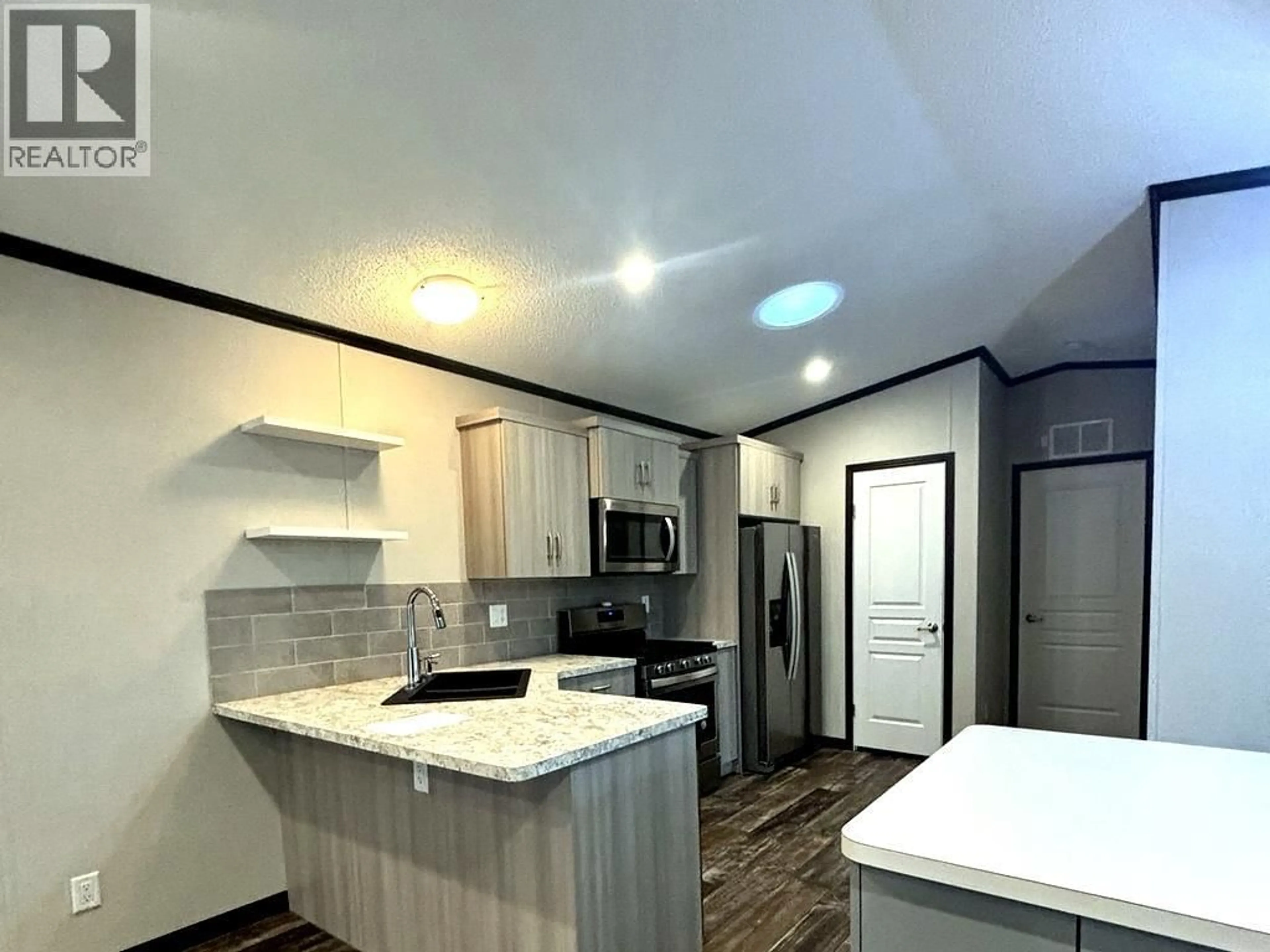 Open concept kitchen, unknown for 47 - 1133 FINDLAY ROAD, Kelowna British Columbia V1X5A9