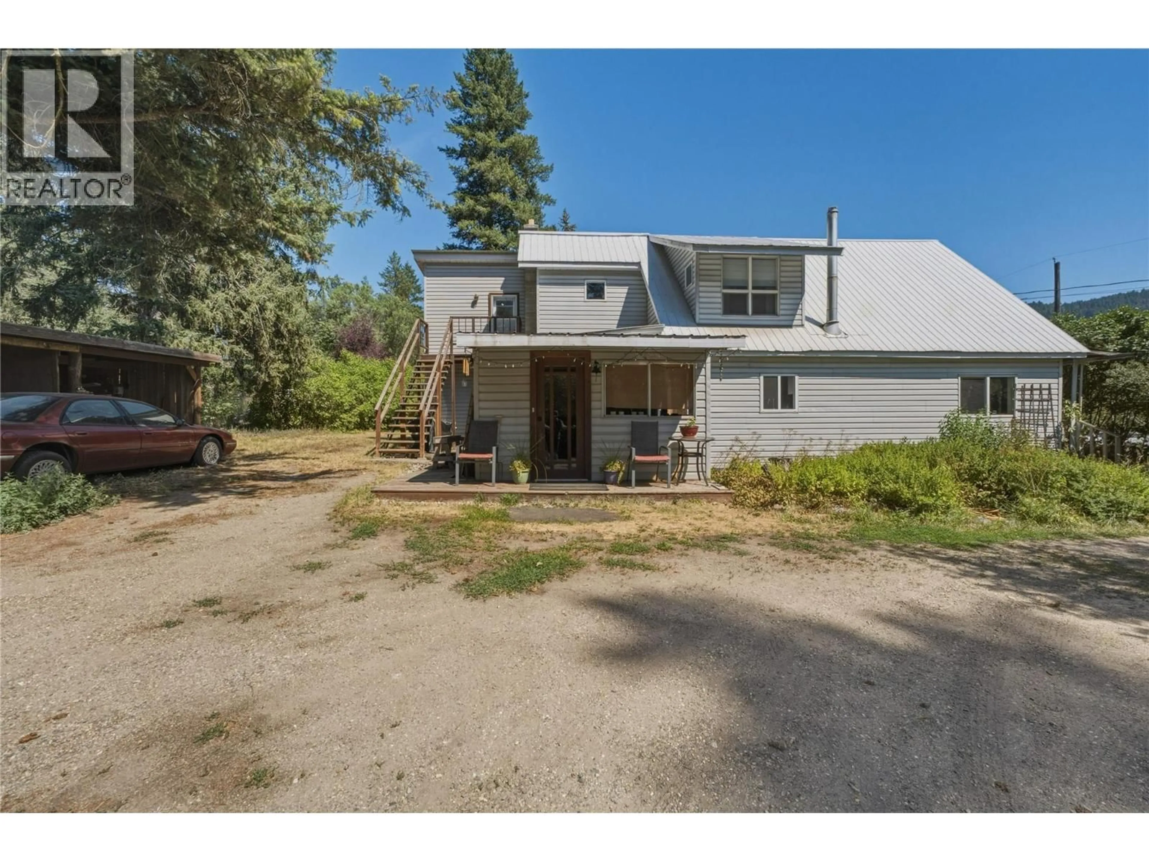 A pic from outside/outdoor area/front of a property/back of a property/a pic from drone, unknown for 244 MABEL LAKE ROAD, Lumby British Columbia V0E2G5