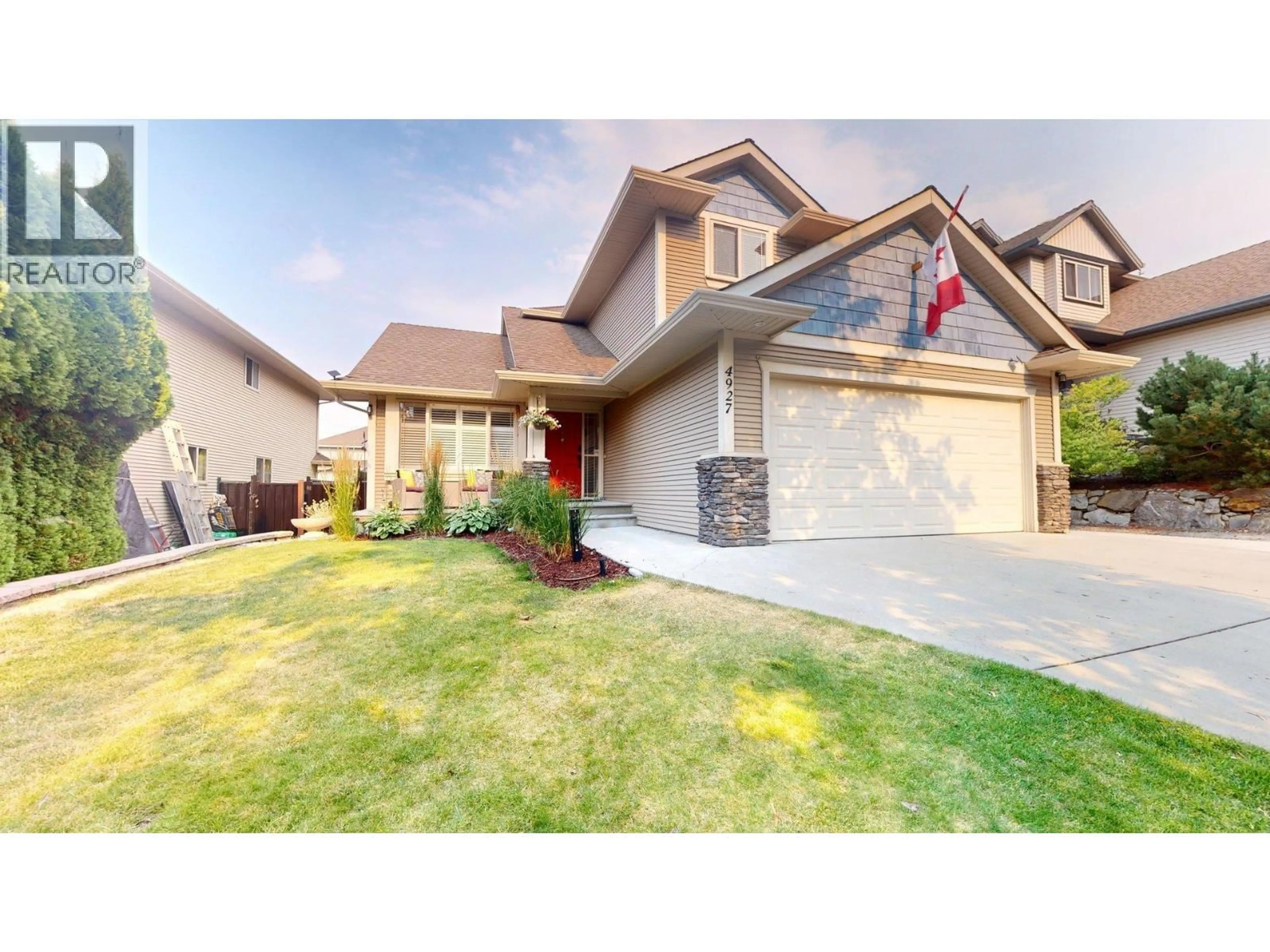 Home with vinyl exterior material, street for 4927 HASKINS COURT, Kelowna British Columbia V1W5B5