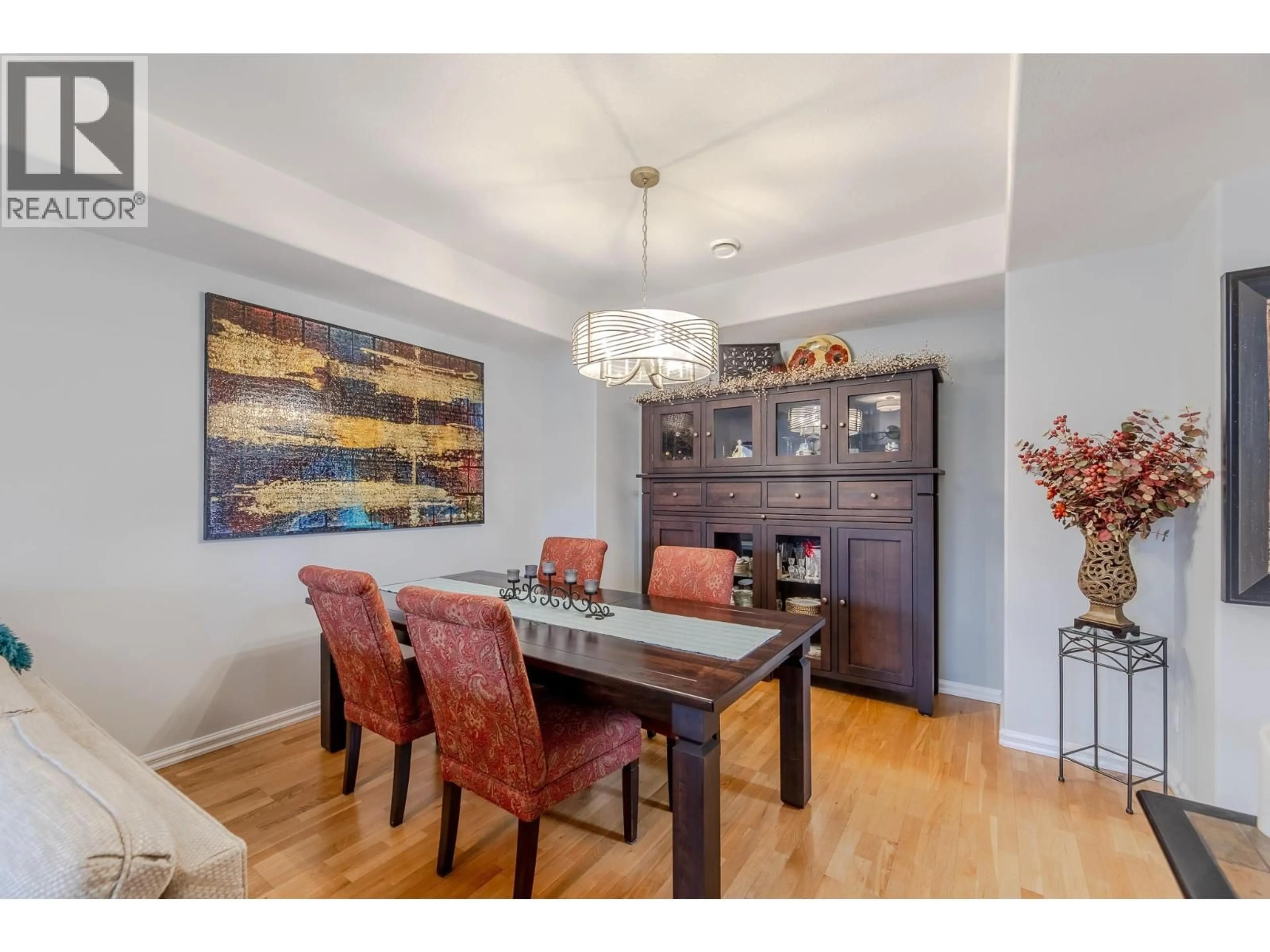 Dining room, wood/laminate floor for 65 - 9800 TURNER STREET, Summerland British Columbia V0H1Z5